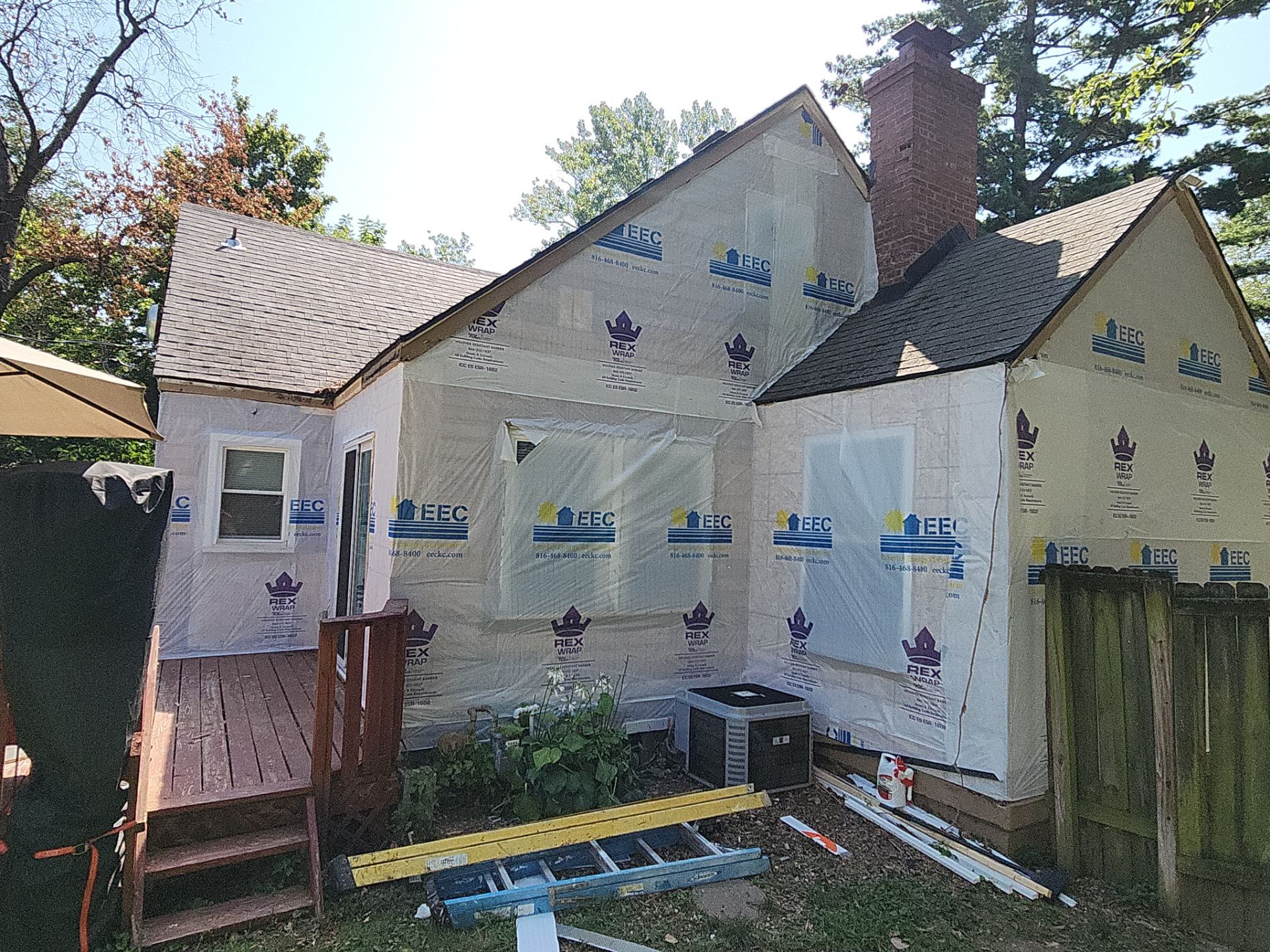 Kansas City Indigo Insulated Craneboard Siding and Window Replacement Project in Kansas City by EEC Windows, Siding & Roofing