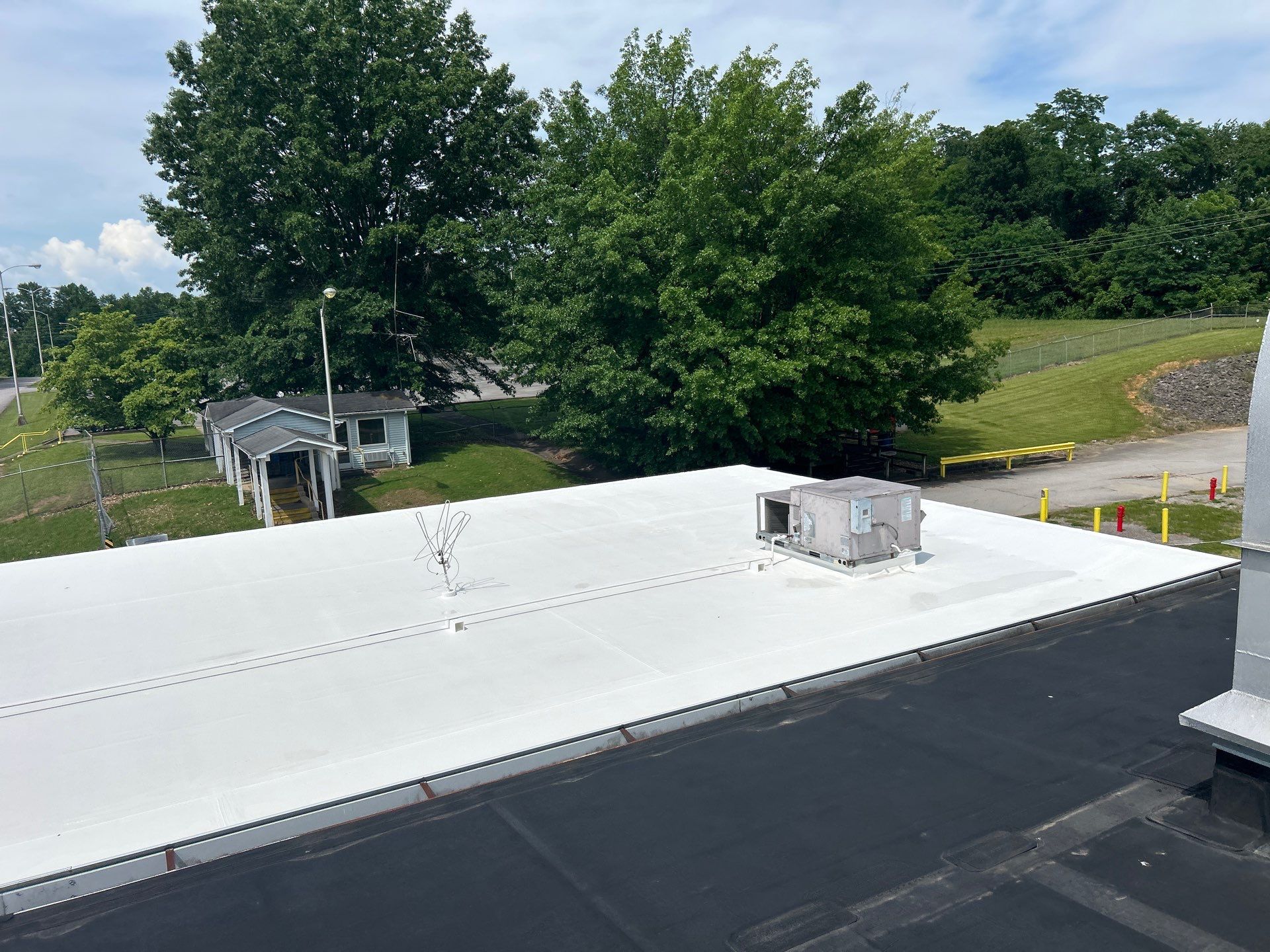 Commercial Roofing Installation using Coatings by Kentucky Commercial Roofing
