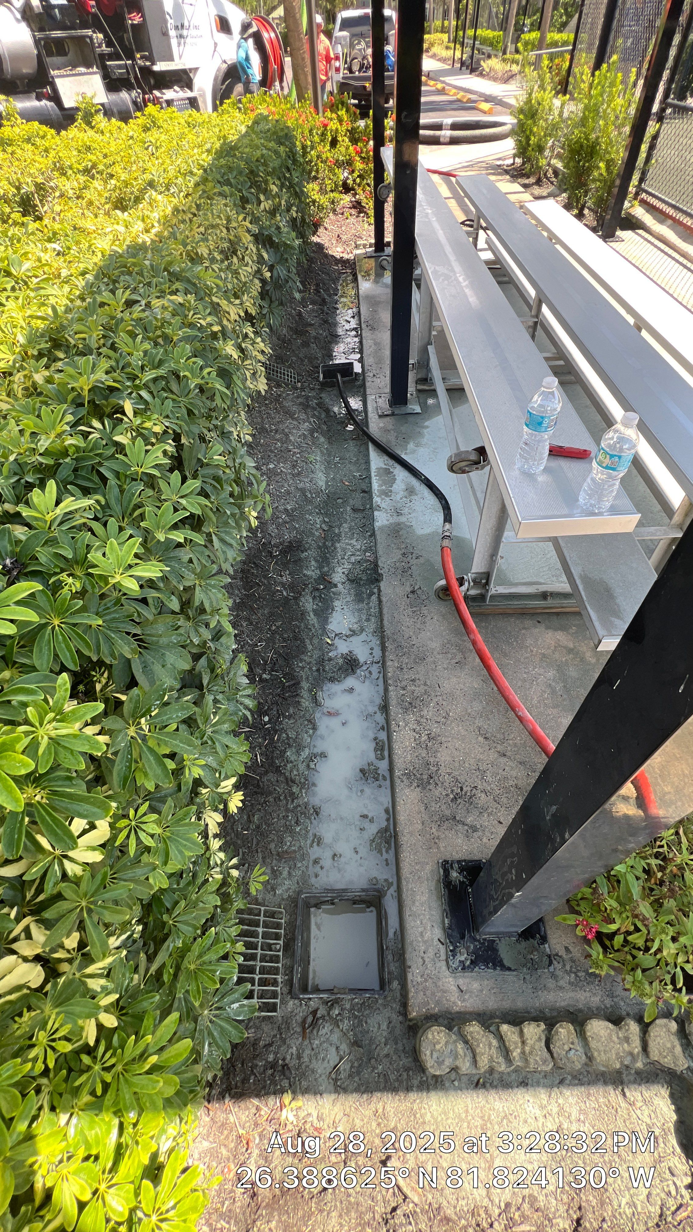 Pelican Landing Tennis Court Catch Basin Cleaning by Don Mar, Inc. Storm Water Solutions