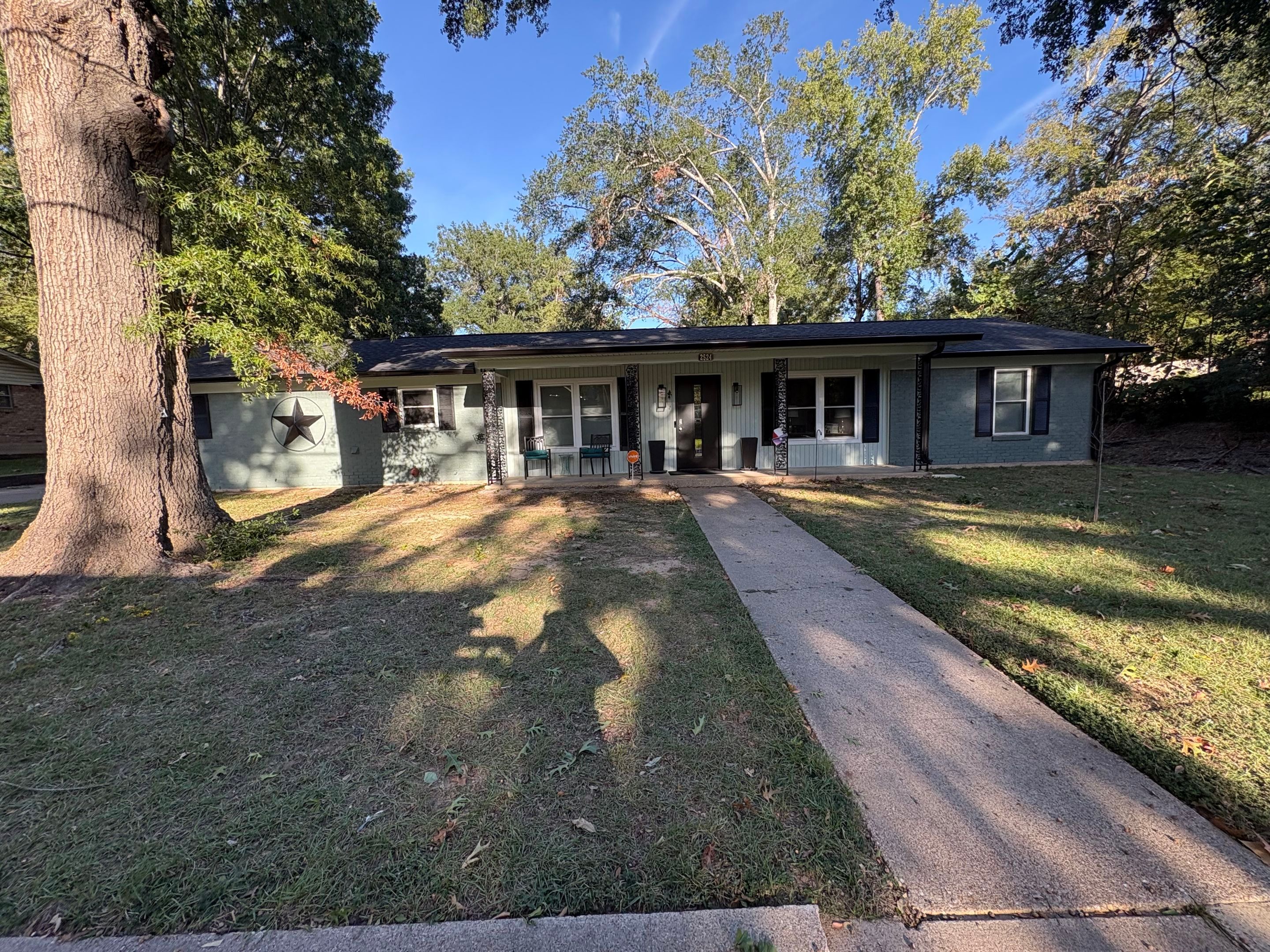 From Basic Brick to Bold Sage Green in Tyler, TX! Quality Coats Painting by Quality Coats Painting