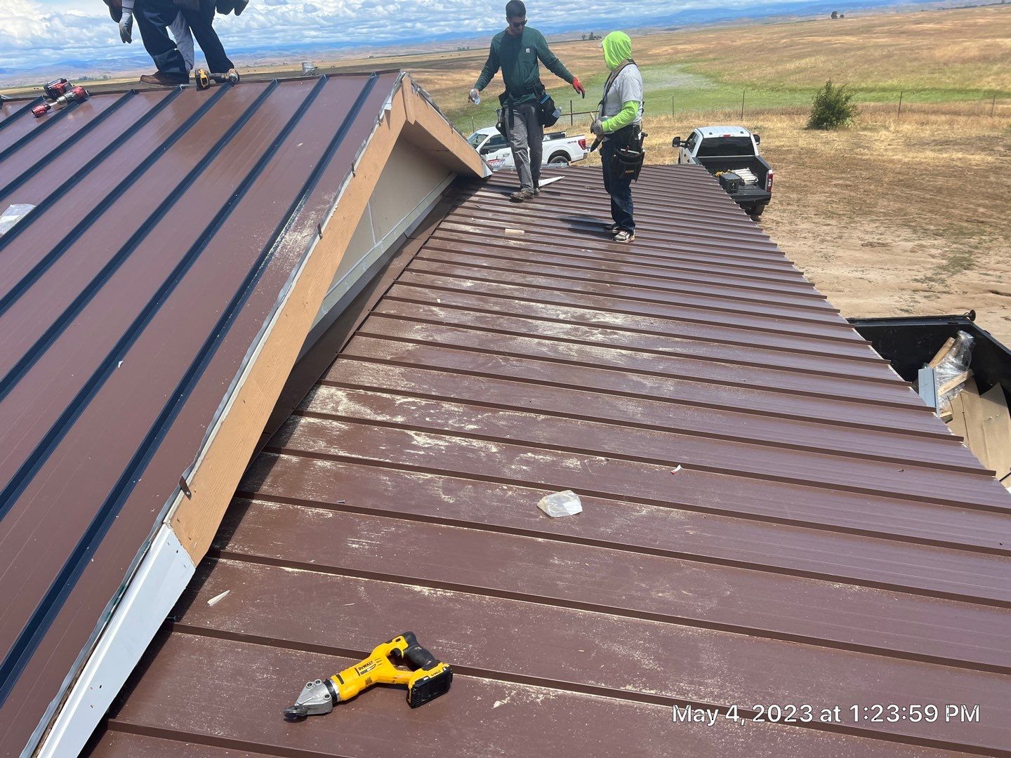 Metal roofing installation using Standing seam metal roofing system by Straight Edge Roofing Inc