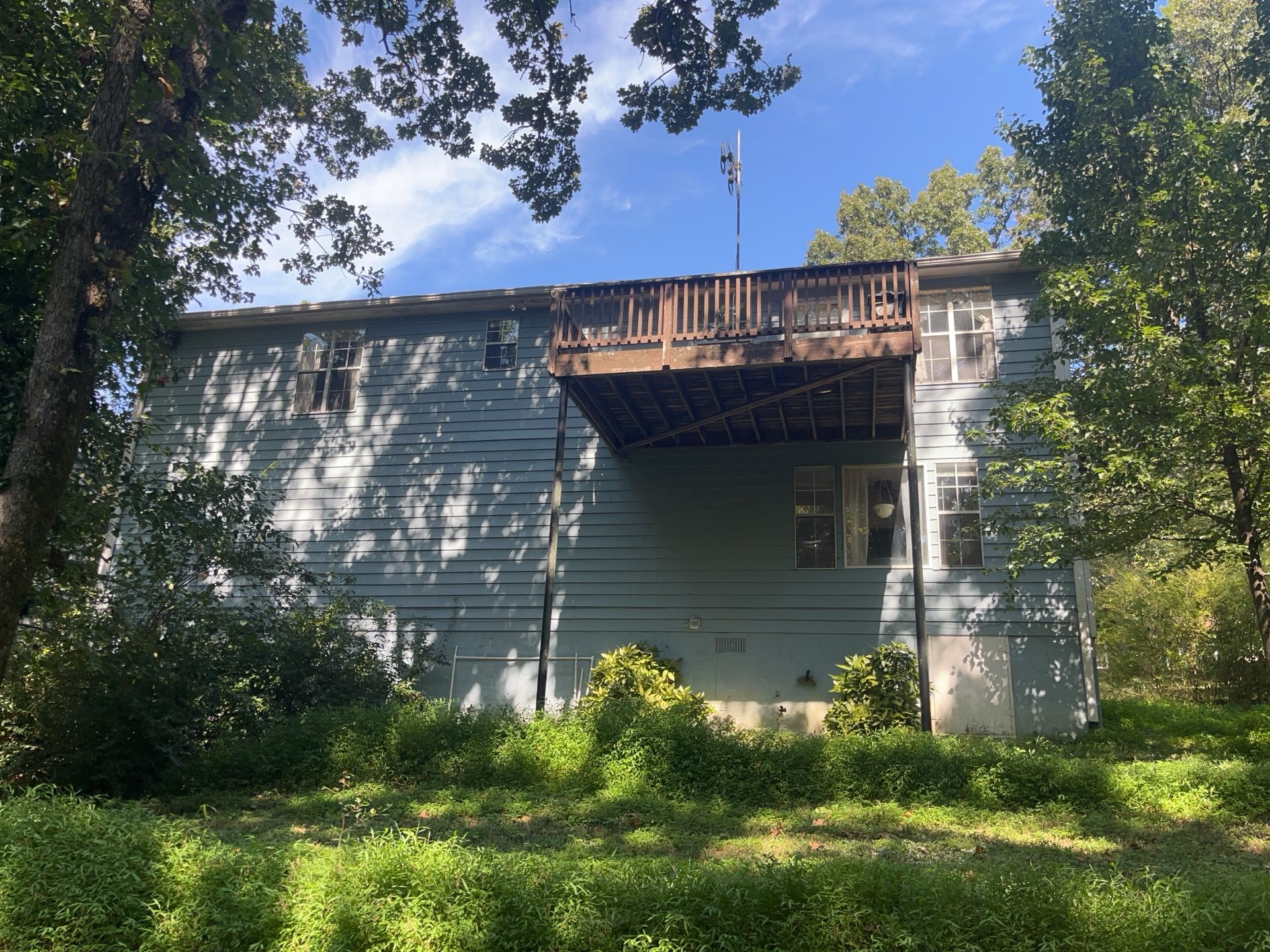 Deckorators Deck Resurface on Front Porch and Wood Deck Resurface on Back Deck by Nelson Exteriors 