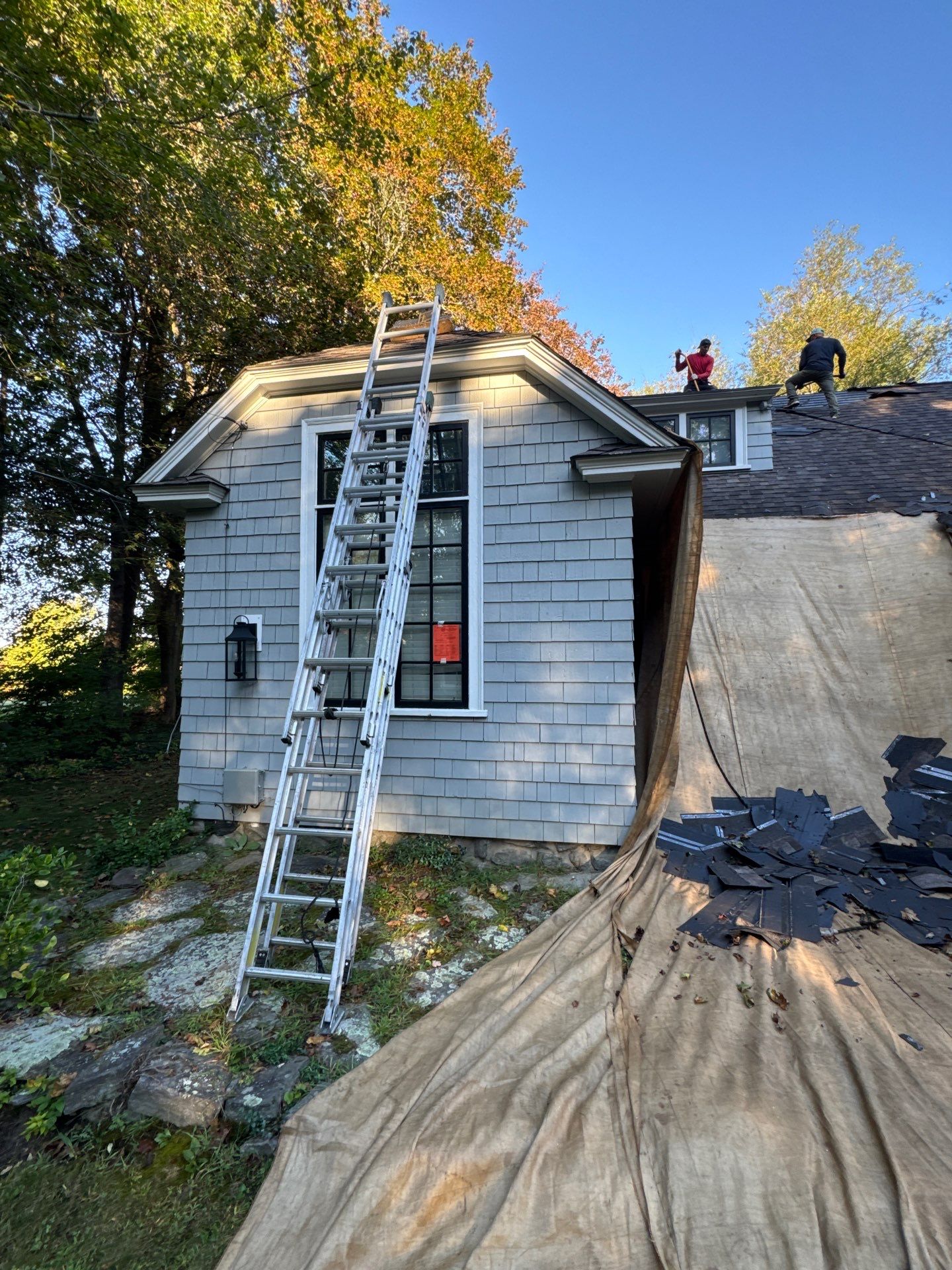 Roof Replacement with EPDM Conversion and Gutter Upgrade – Littleton, MA by Mighty Dog Roofing of Greater Middlesex County