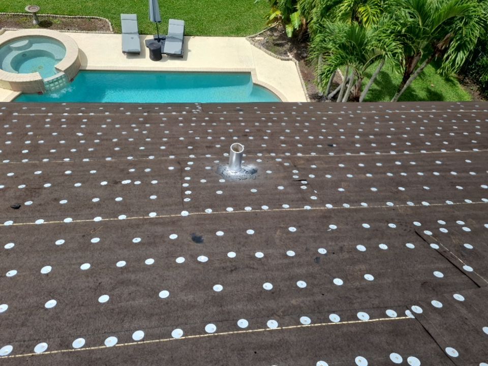 Residential Roofing Installation using 1" Nail strip metal roof by BLUES BROTHERS ROOFING