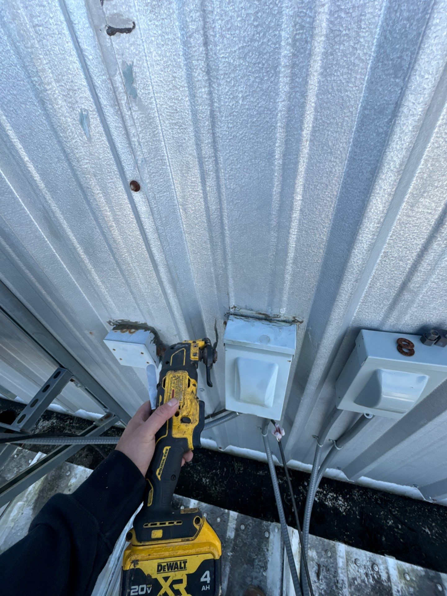 Metal Roof Leak Repair by Associates Roofing Unlimited
