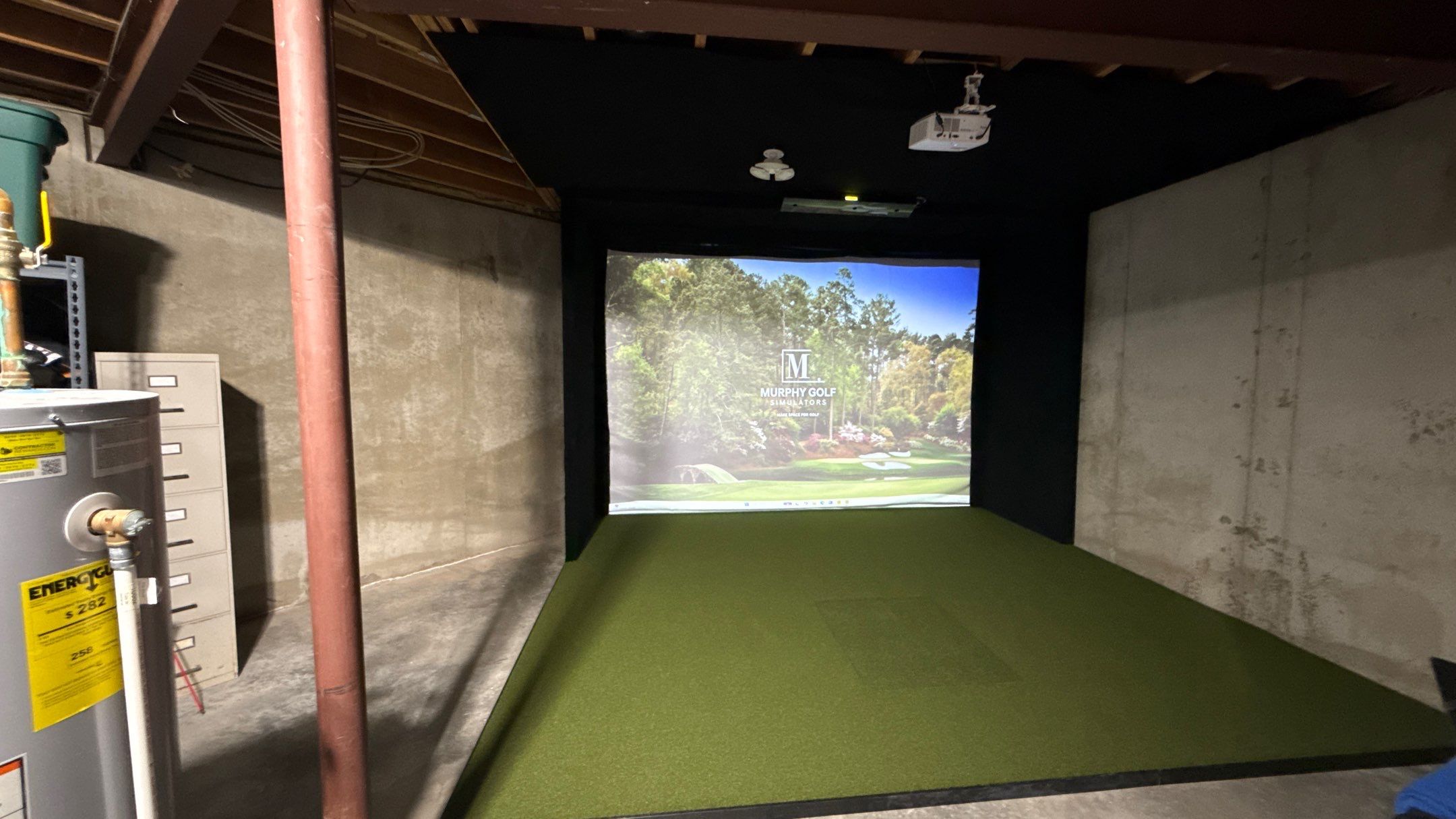 Rex Went With A Custom Golf Simulator  by Banner Garage
