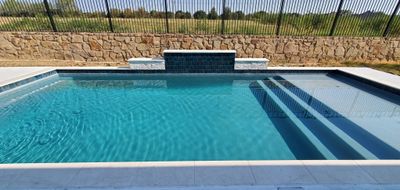 Modern Geometric Pool with Raised Spa