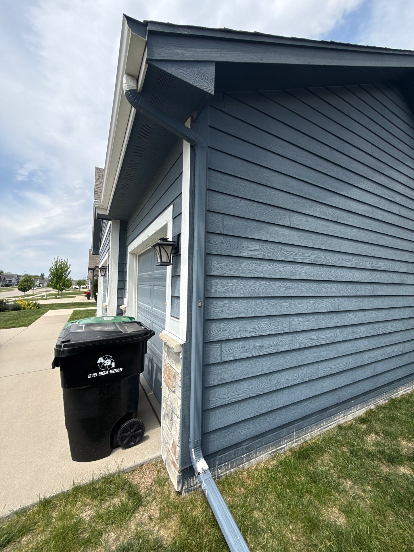 Residential Exterior Repaint in Ankeny by Midwest Paint LLC