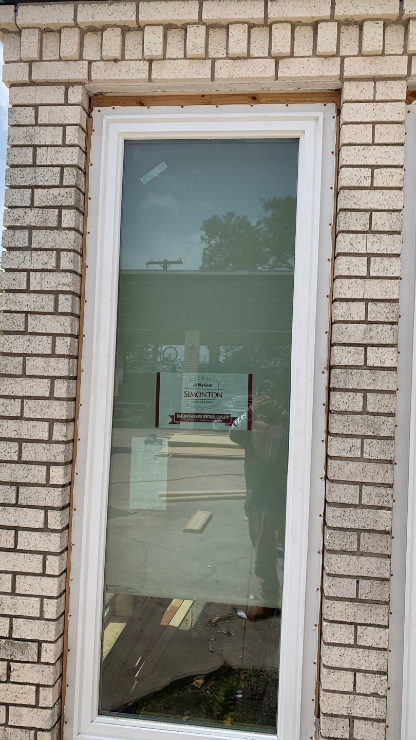 Mansard Charm by Bayfront Roofing and Construction