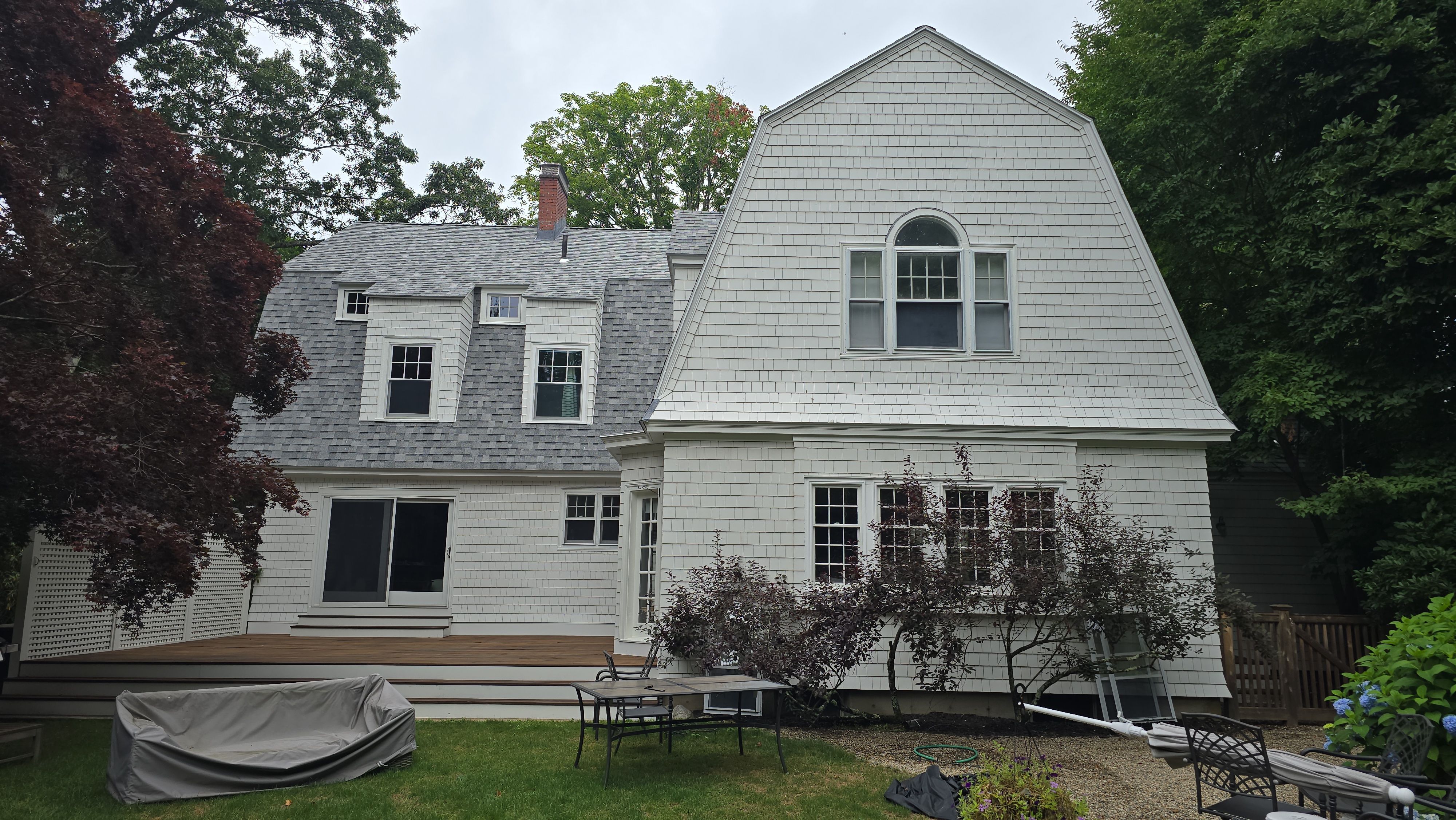 White cedar shingles and windows in Wayland, MA by UBrothers Construction