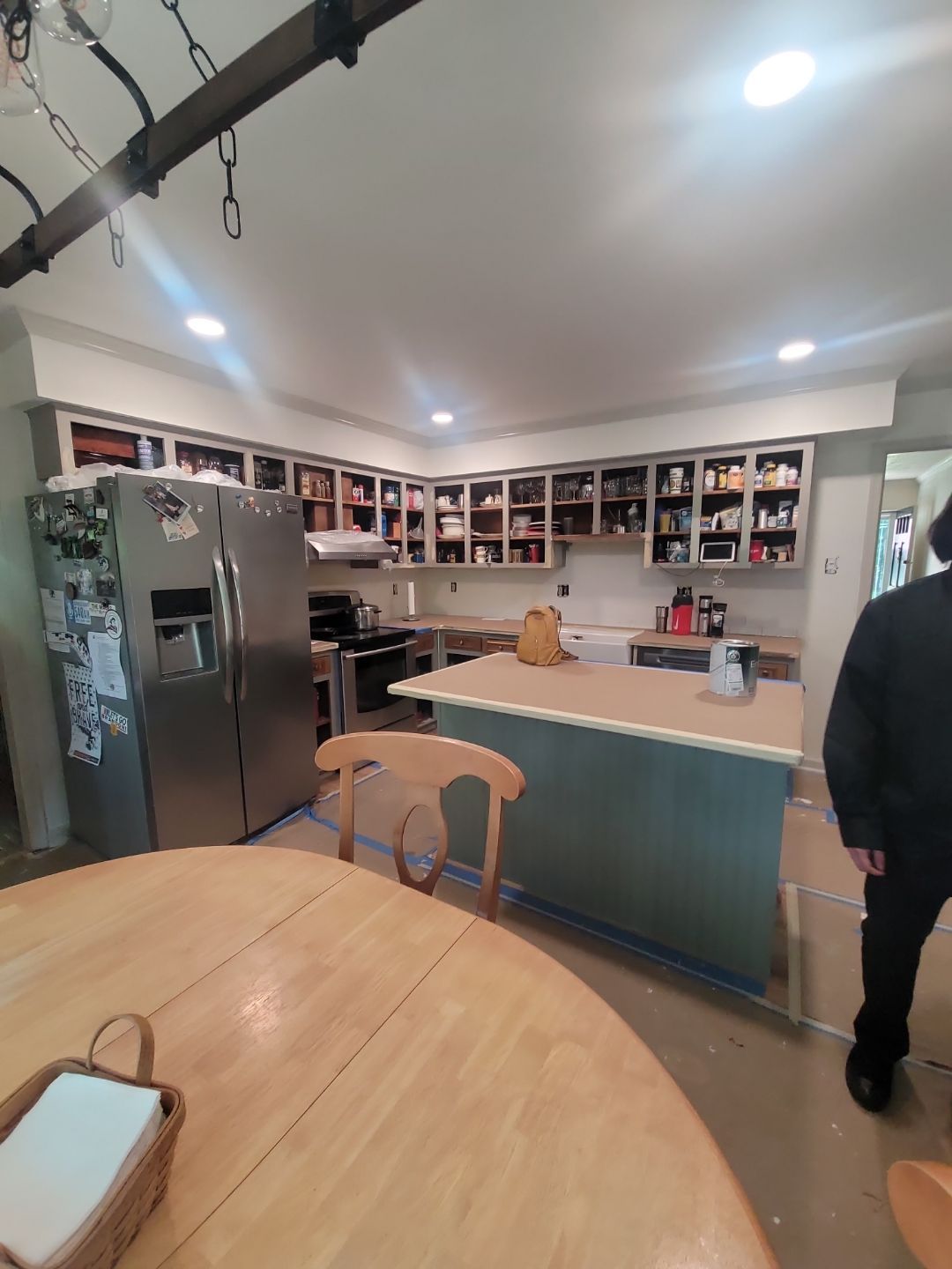 A Pathway to Personality – A Two-Tone Kitchen Transformation in Apex by Elite Remodeling and Design LLC