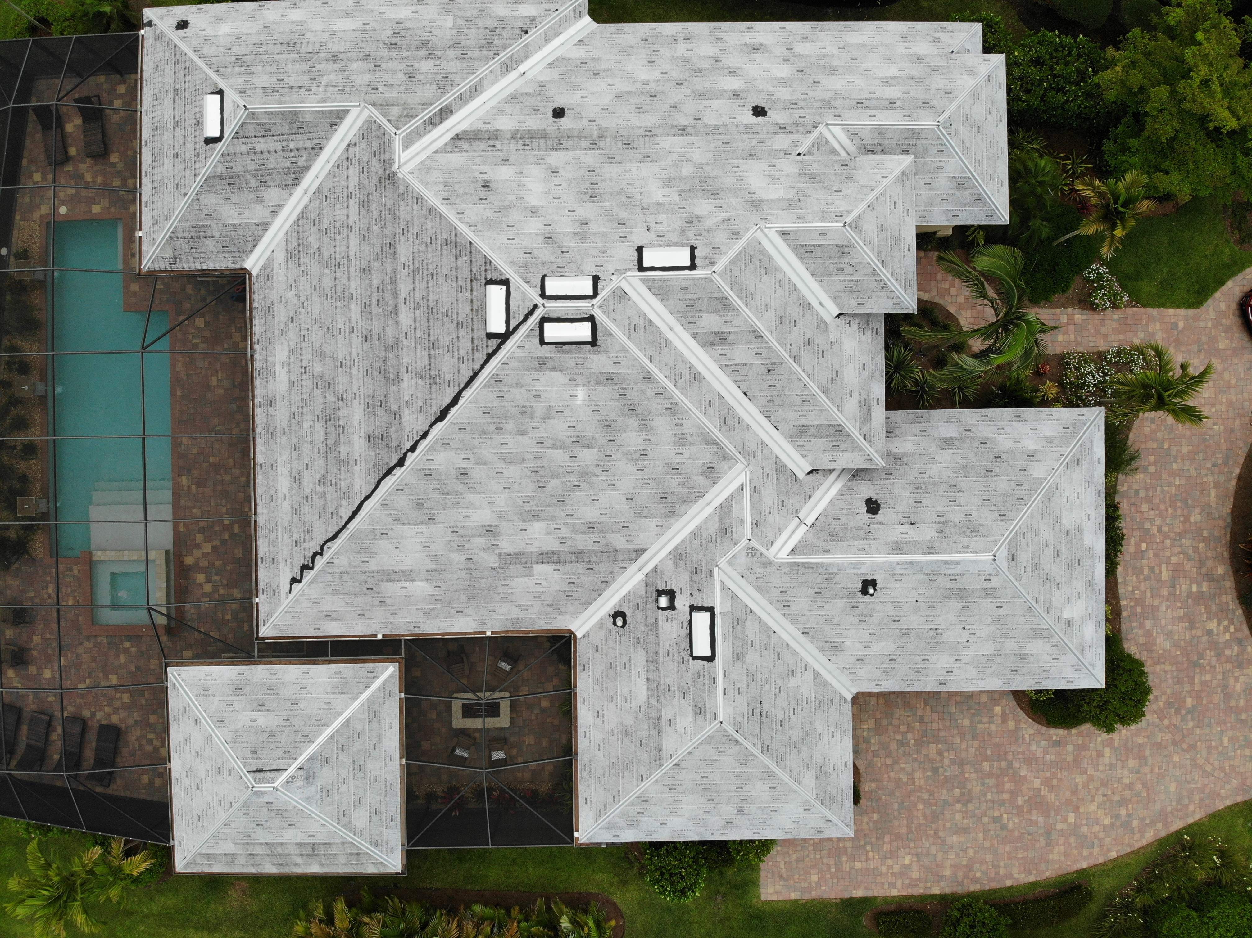Residential Roofing Installation using Composite Spanish Tile by International Roofing