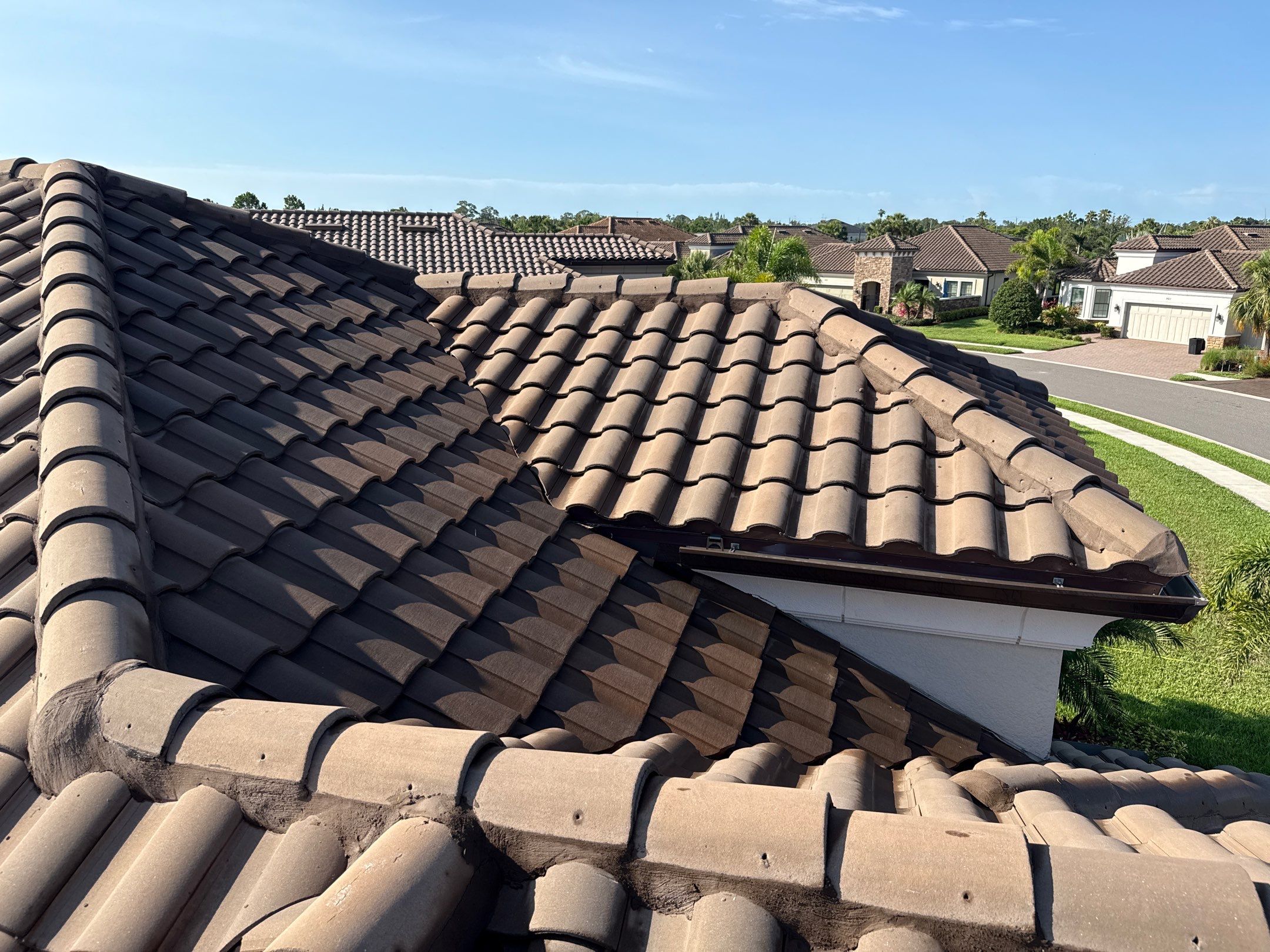 Concrete Tile Roof, Paver Driveway & Lanai Cleaning – Artisan Lakes Esplanade, Palmetto, FL by Sunshine AquaWash
