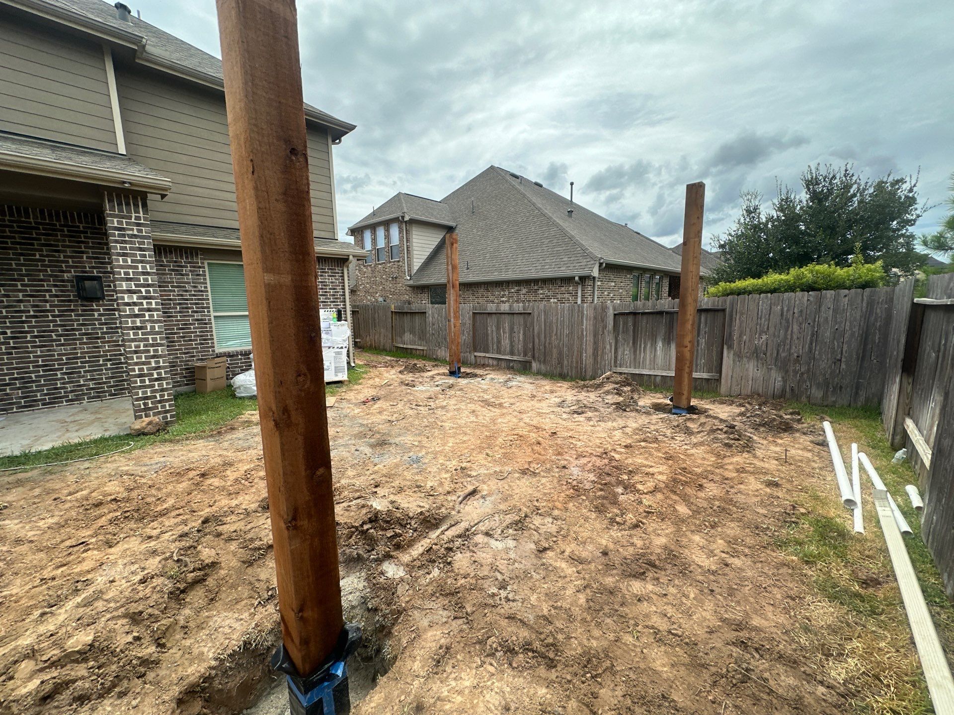 Covered Patio and Summer Kitchen in Spring,  TX by SophAlx LLC