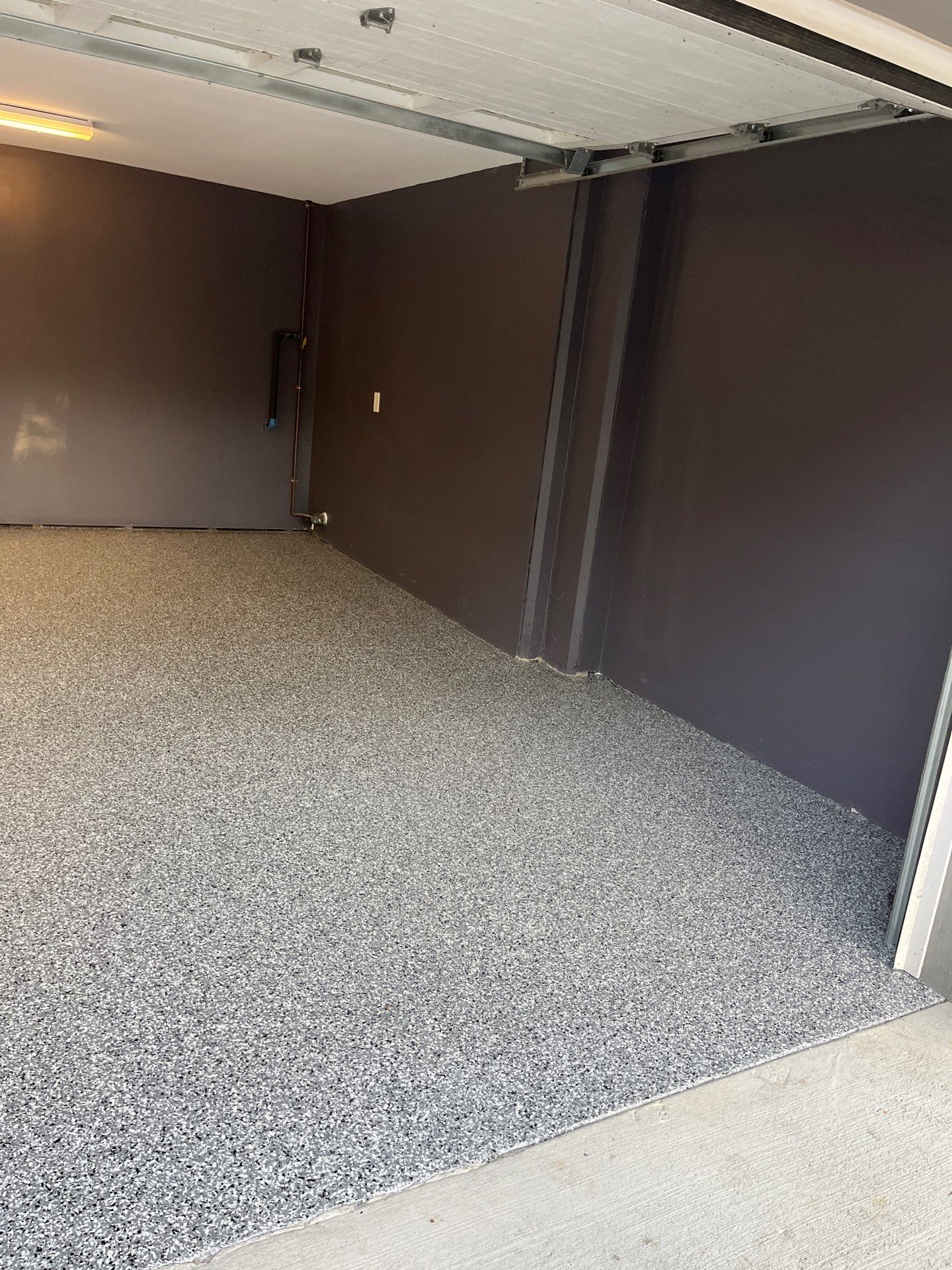 Garage Floor Coating using Wombat by My Garage Floor Guys