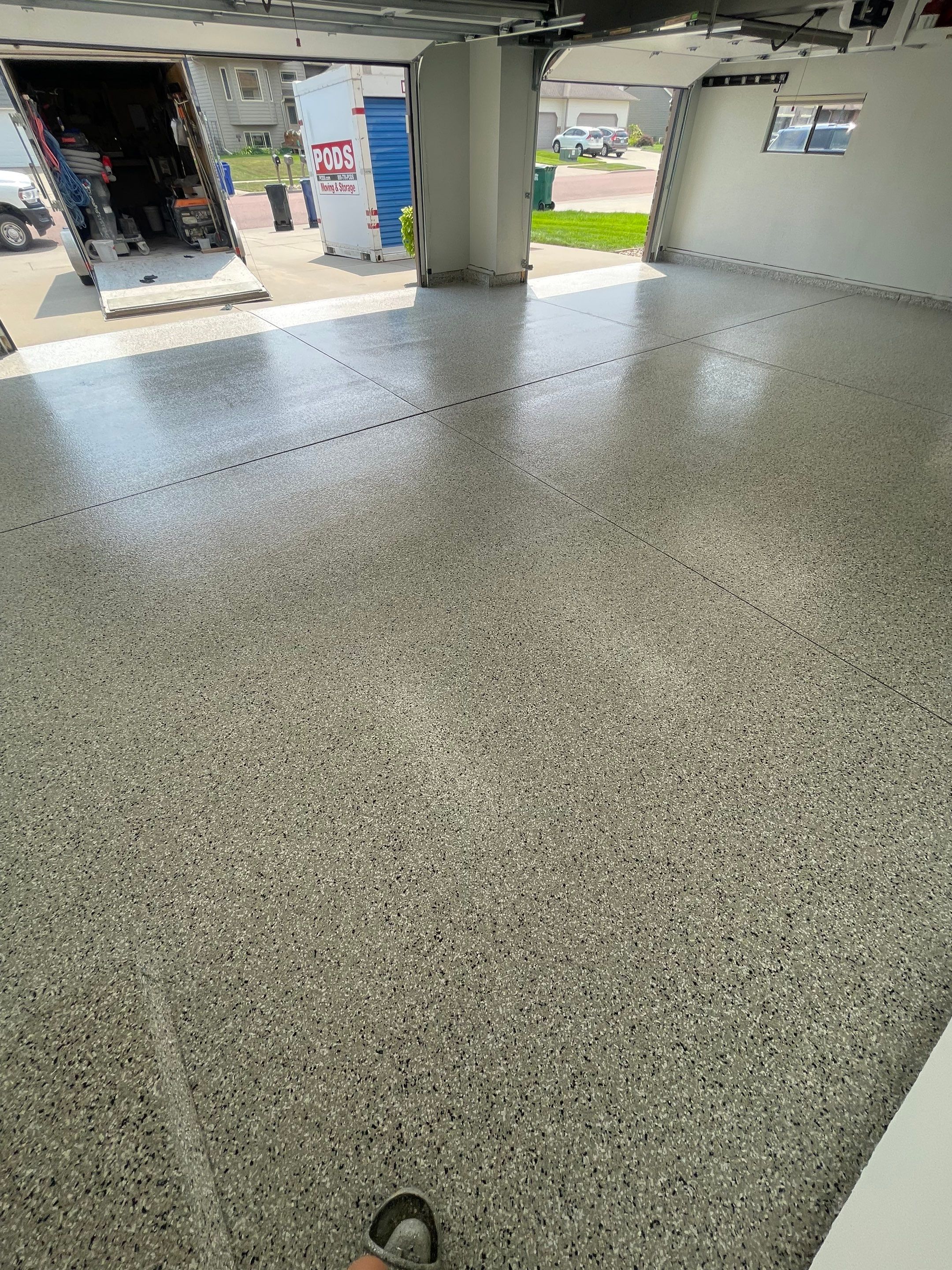 Multi-Car Garage Floor Coating and Crack Repair in Tea by Select Painting, Coatings & Garage Cabinets