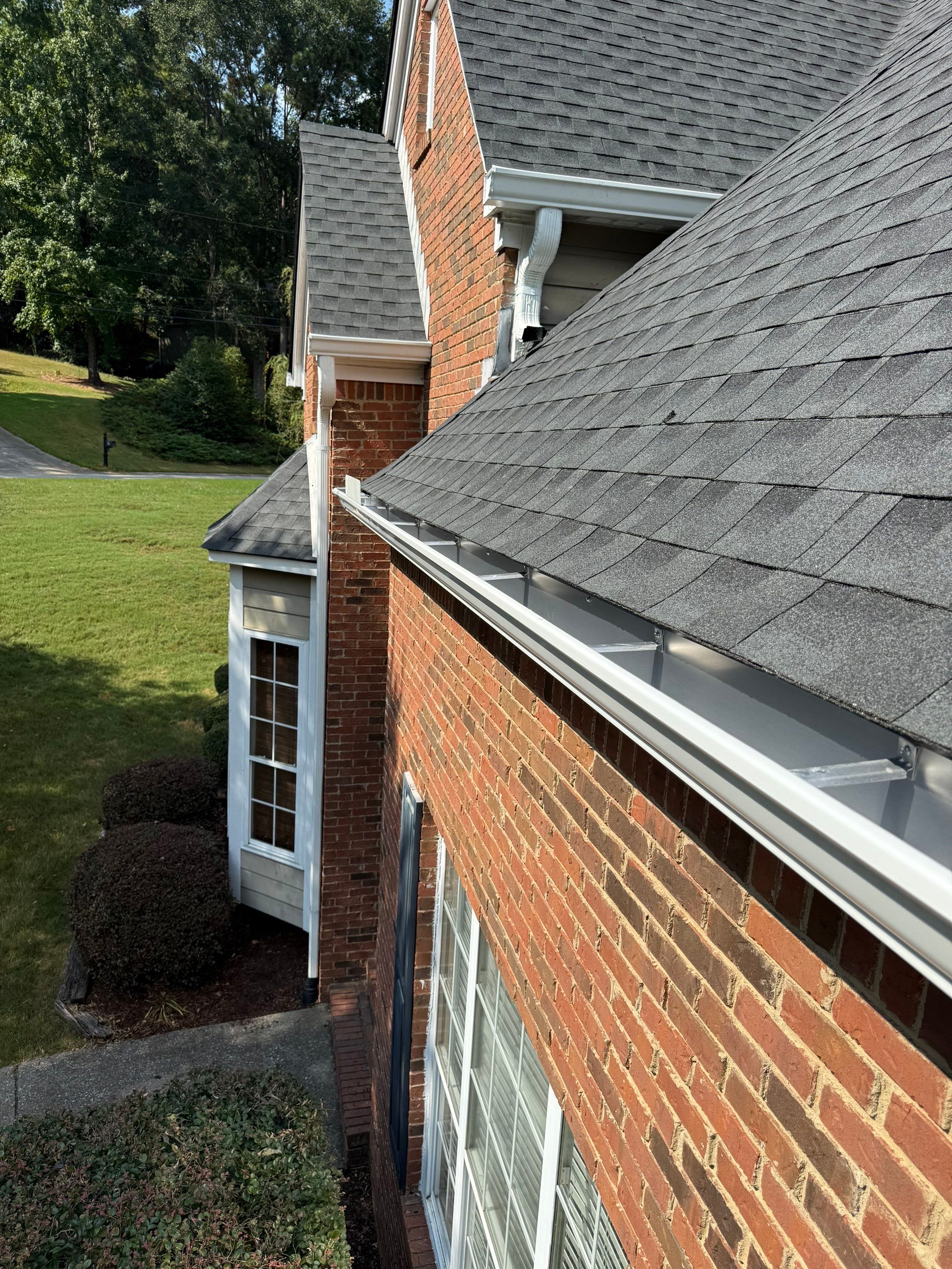 Roof Replacement, Gutter Replacement, and Chimney Cap Replacement in Sterrett by The Roofing Dudes