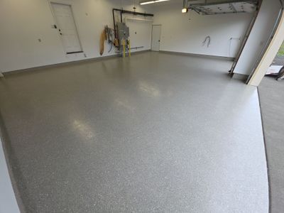 Travertine Hybrid Garage Floor Coating and Crack Repair in Spokane