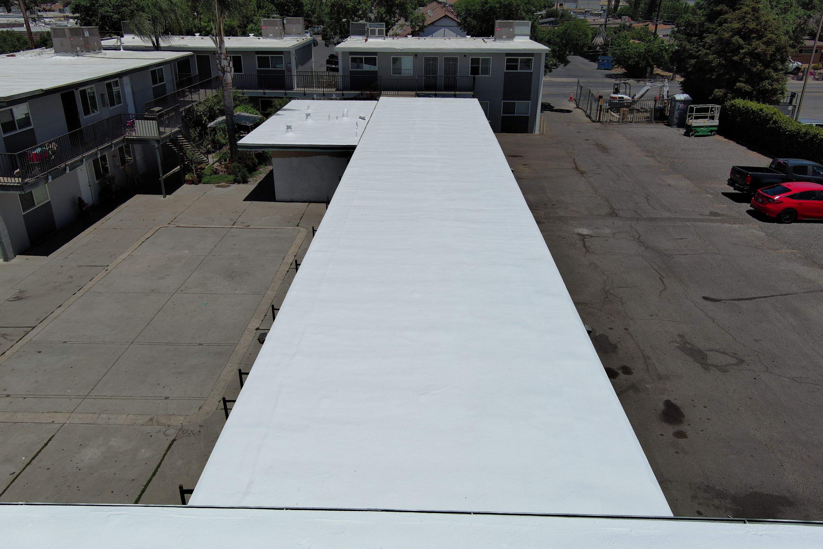 Foam Refurbish using General Coatings acrylic coatings and spray foam by Straight Edge Roofing Inc