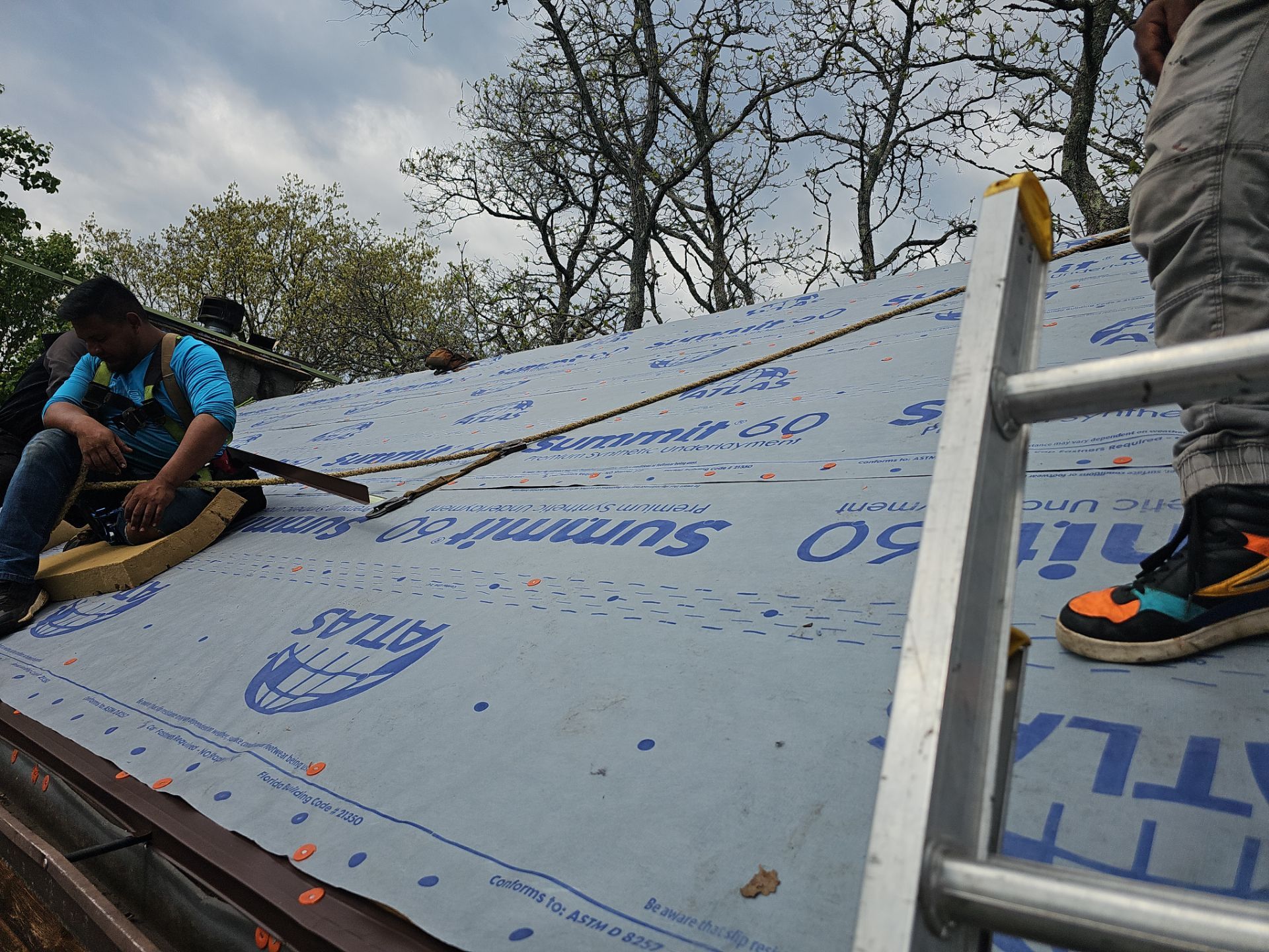 Residential Roof + Gutters & Downspouts Install  by Titan Commercial & Residential Roofing 