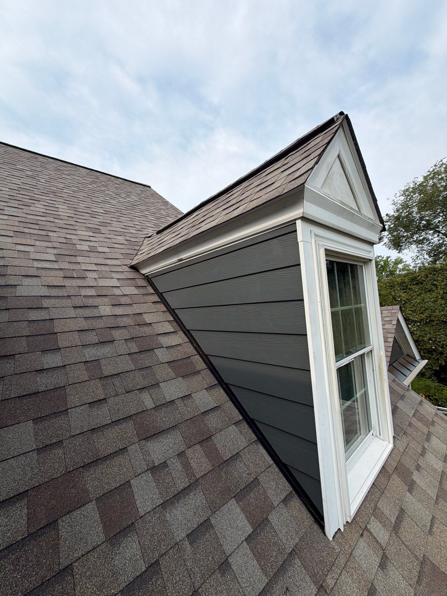 Roof Replacement and White Gutter Installation in Gloucester by Cade Construction