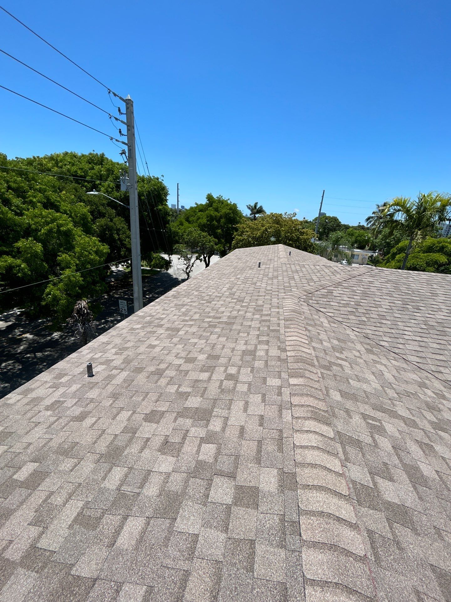 Commercial Roofing Installation using CERTAINTEED LANDMARK AR (SUNRISE CEDAR) by Earl W. Johnston Roofing 