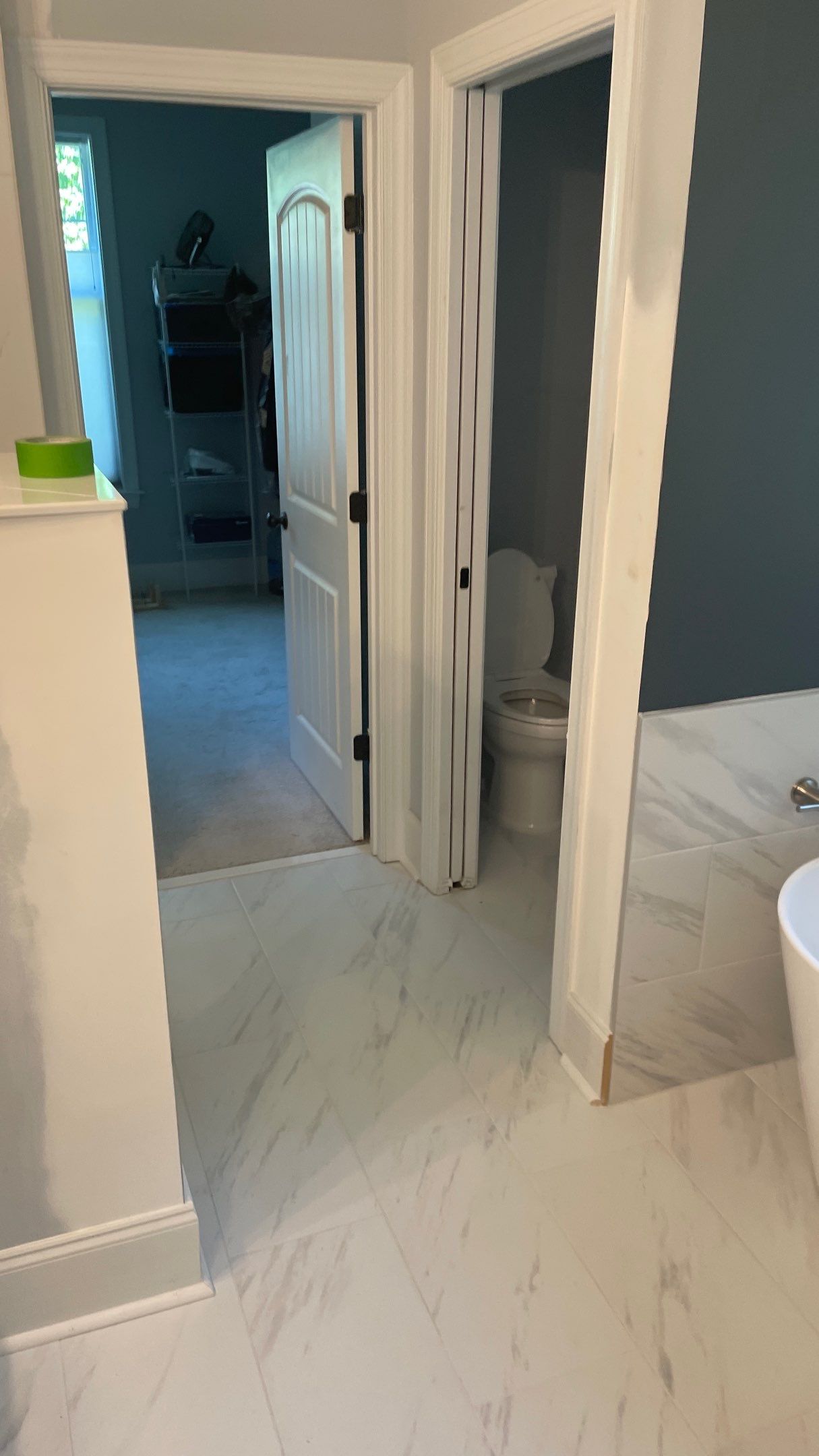 Bright Bathroom Remodel with Wall Removal, Stand Alone Tub and New Vanity by Footprints Floors of Coastal Carolina