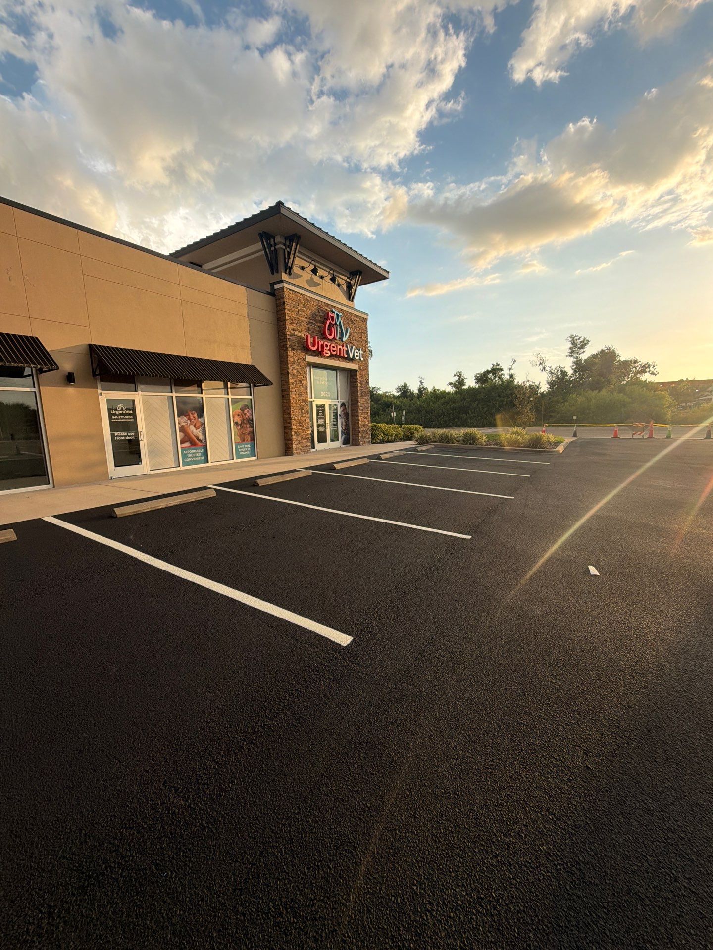 Commercial Asphalt Sealcoating and Line Striping at School House Plaza by Everline Coatings & Services - Southwest FL