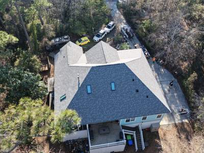 Indigo Plantation Southport NC Fortified Roof Replacement Southport NC CertainTeed Landmark Pro Cobblestone Gray Skylight Installation