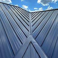 24ga 1.5" Mechanical Seam Dark Bronze by Total Roofing System The Metal Roof Experts