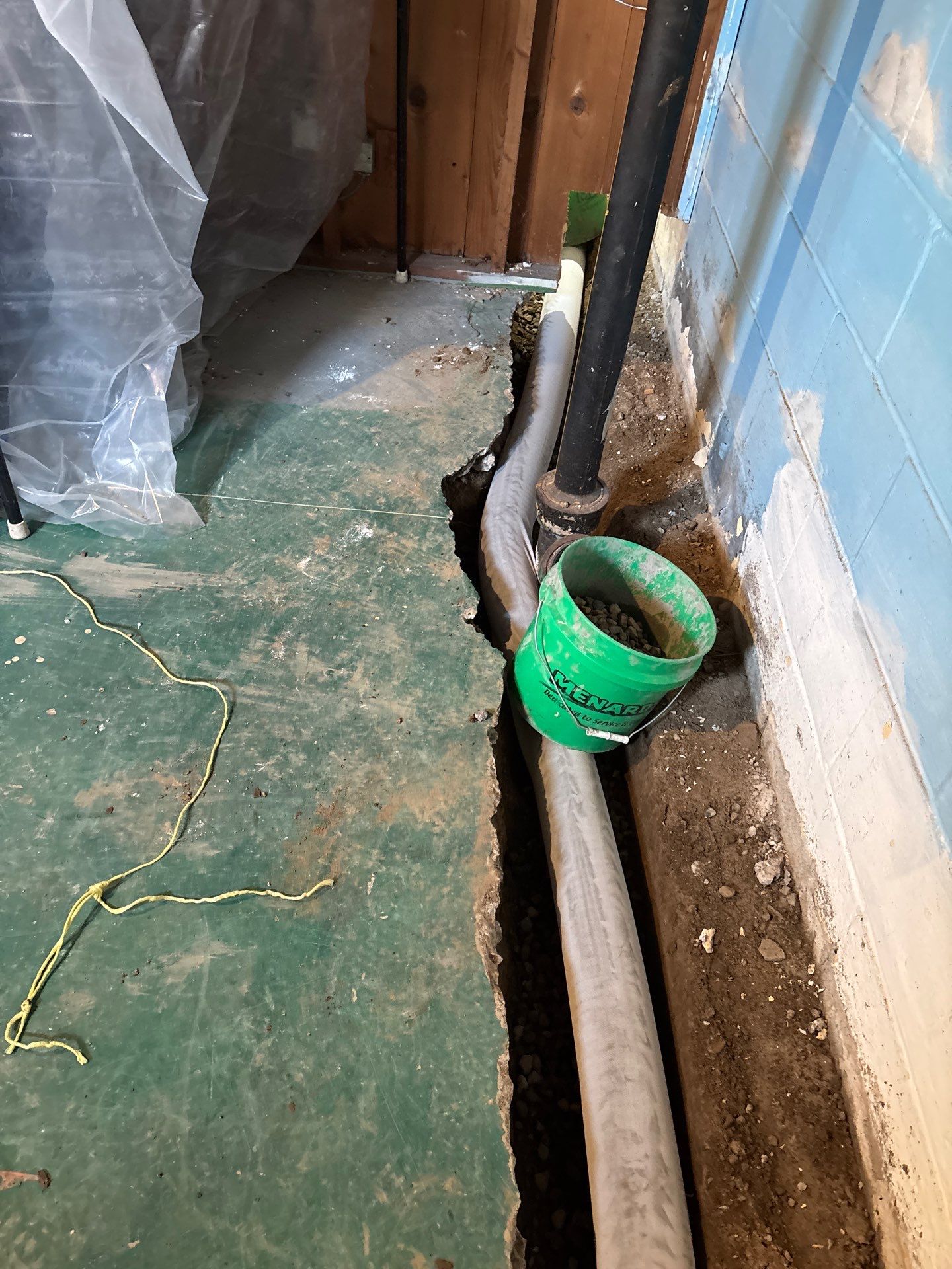 Completing the Connection for Lisa's Drain Tile System by Waterproofing Northeast