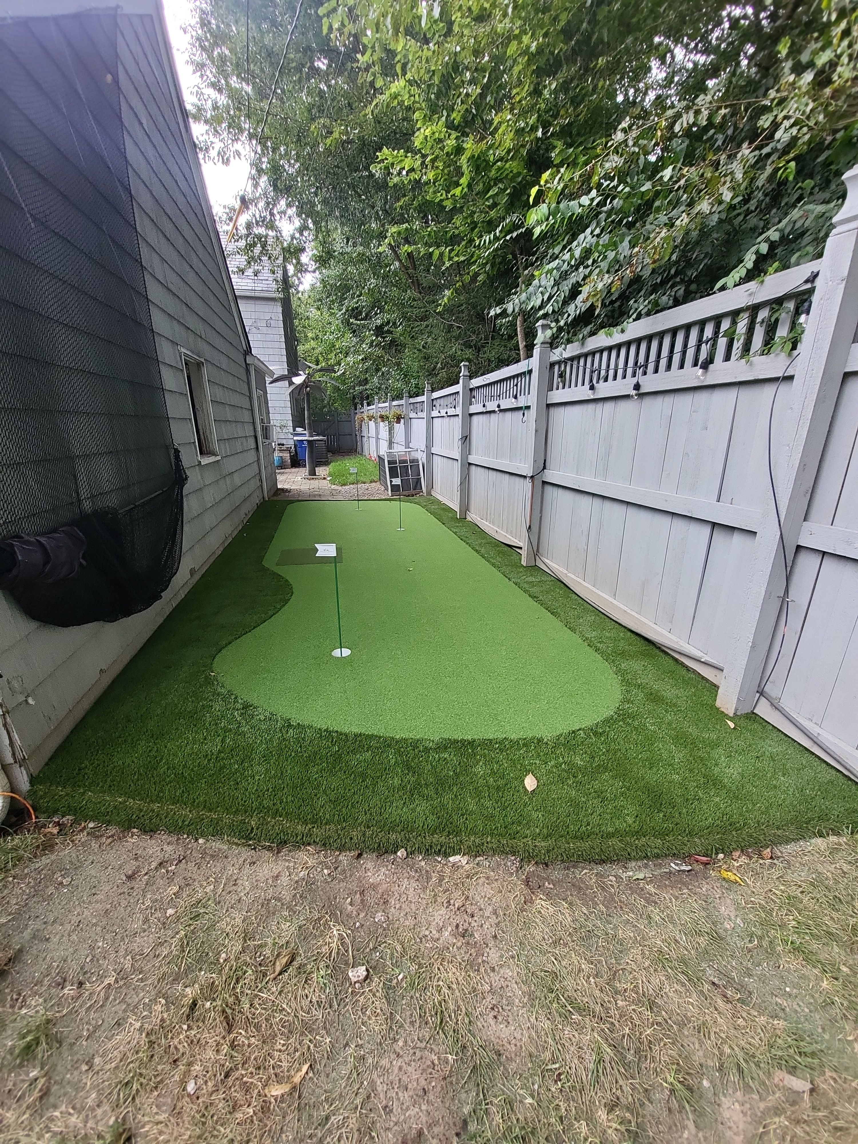 Custom Side Yard Artificial Turf Putting Green Installation in Columbus by Southwest Greens Midwest