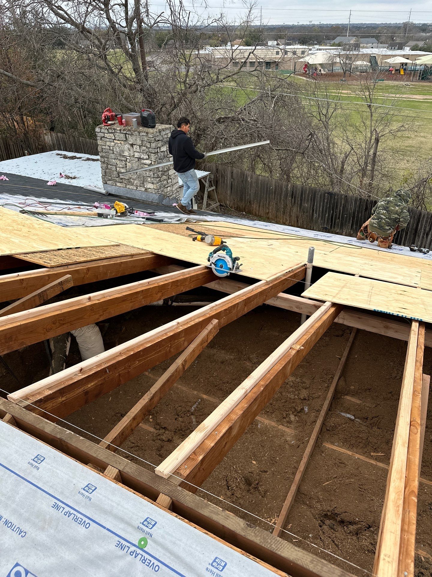 Residential Roofing Installation using IKO Dynasty Shadow Brown by DeZign Roofing & Exteriors