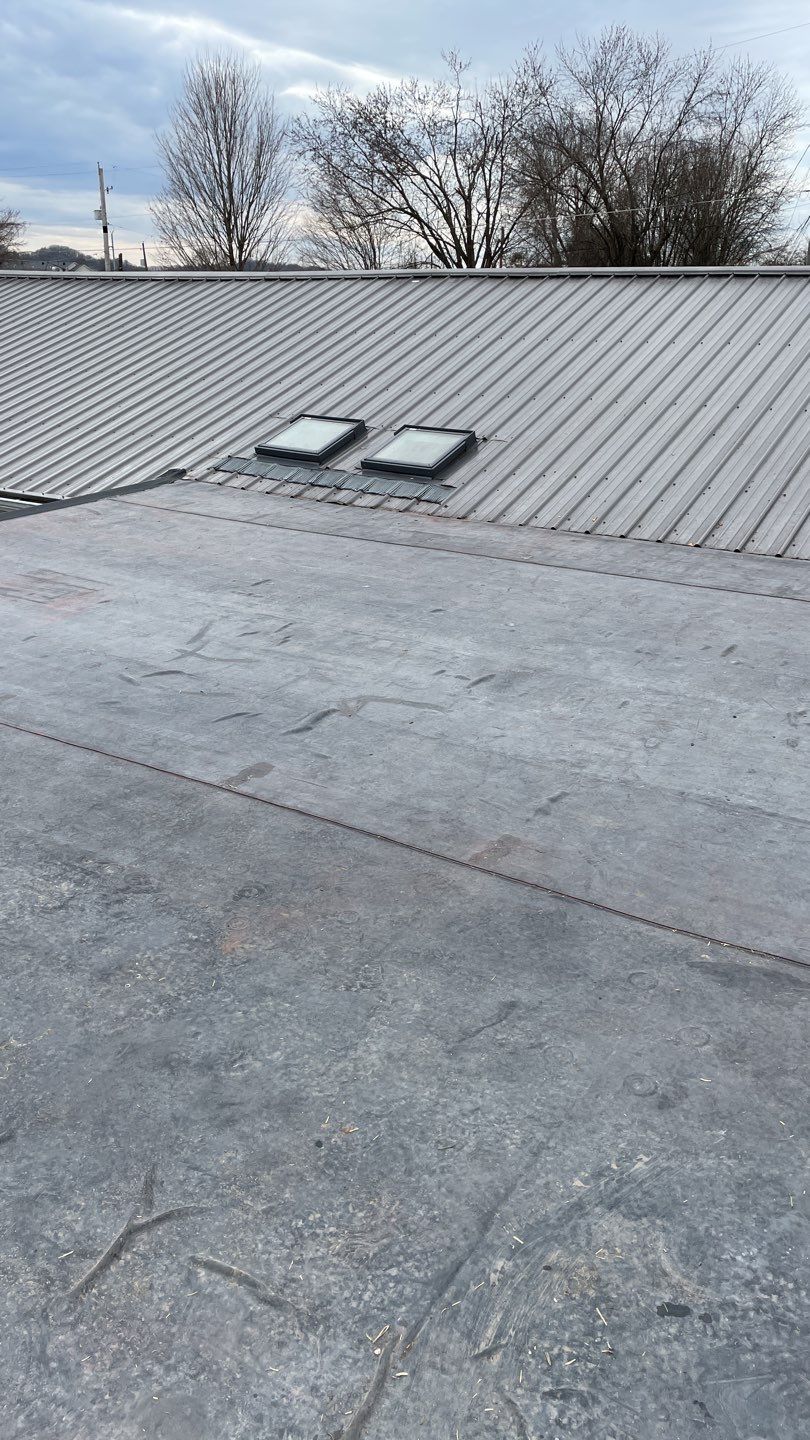 Rubber Roofing  on a residential sunroom by Secure Construction Company Inc
