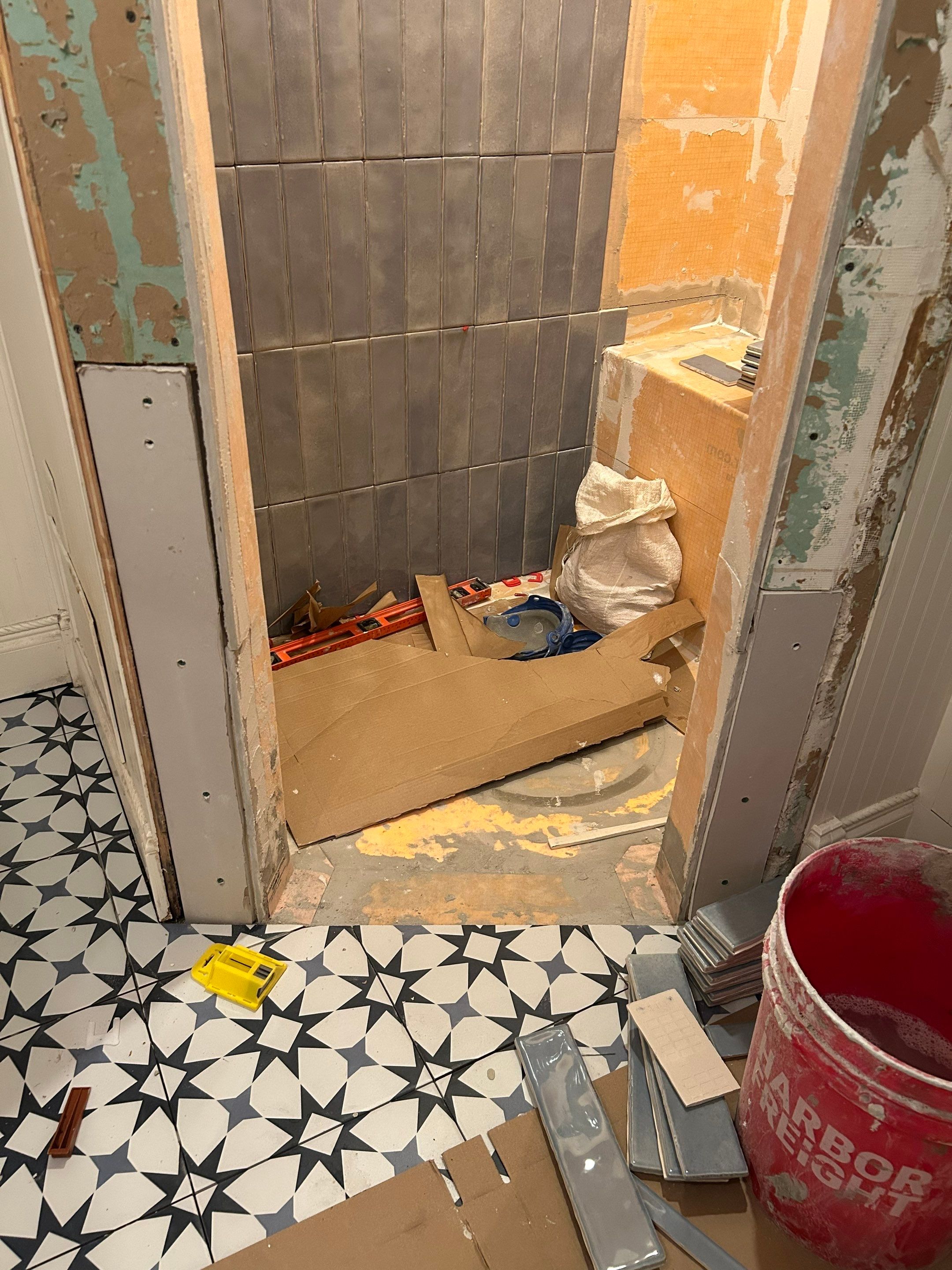 Tile shower and floor by Footprints Floors of Nashville