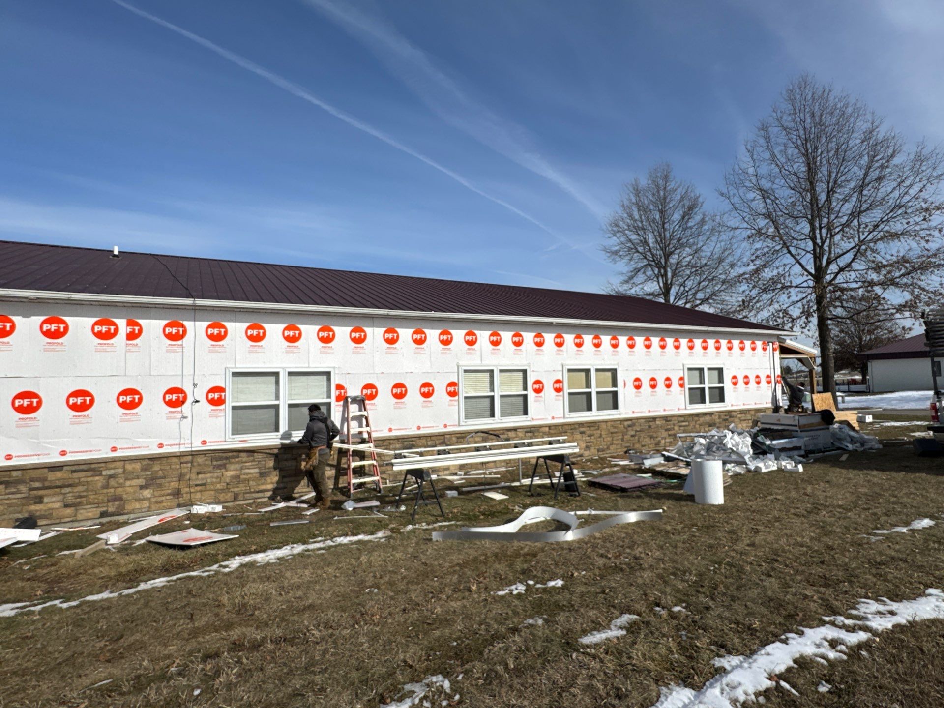 Siding and Stone Installation using Extrerior Porfolio Vinyl Siding and Versetta Stone by EEC  Windows, Siding & Roofing 