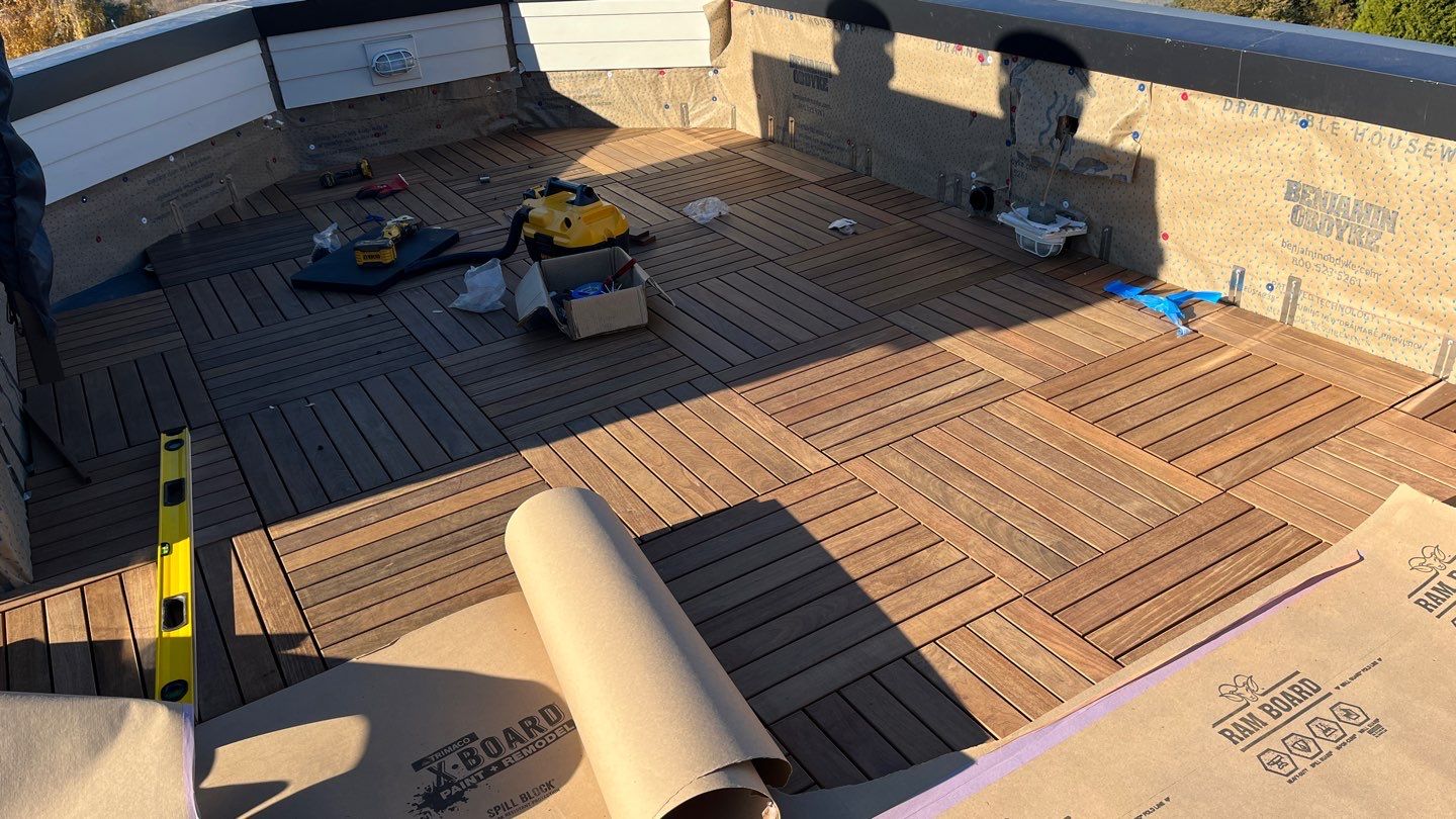 Seattle Queen Anne Rooftop Deck and Roof Replacement using Standing Seam Metal - Black by RoofSmart