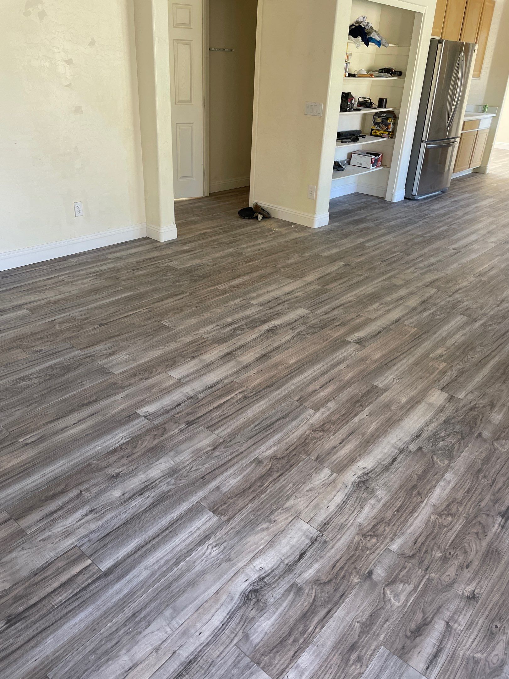 Laminate Staircase and Flooring  by Footprints Floors of Chandler 