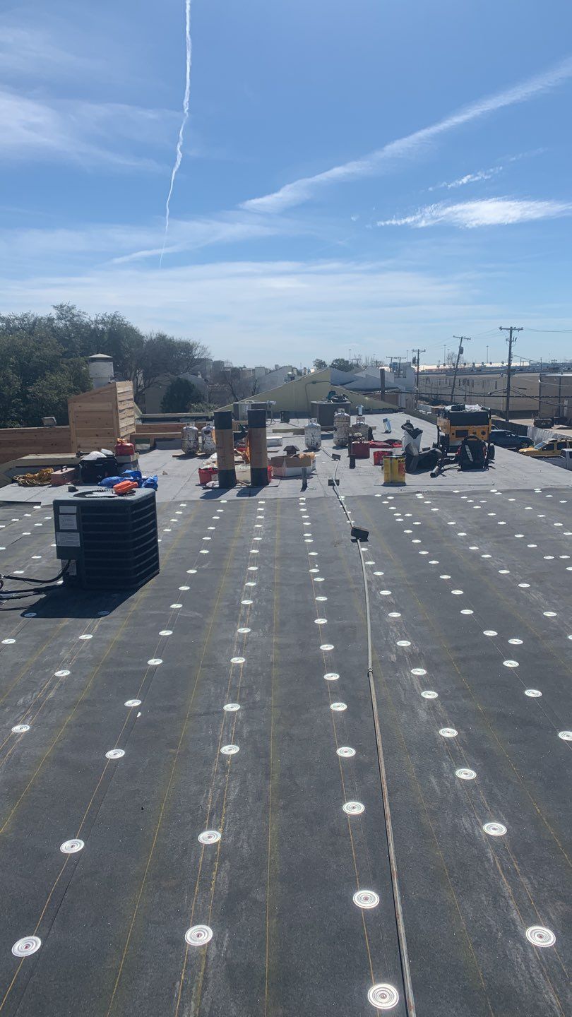 Apartment Roof Replacement by First Out Roofing 