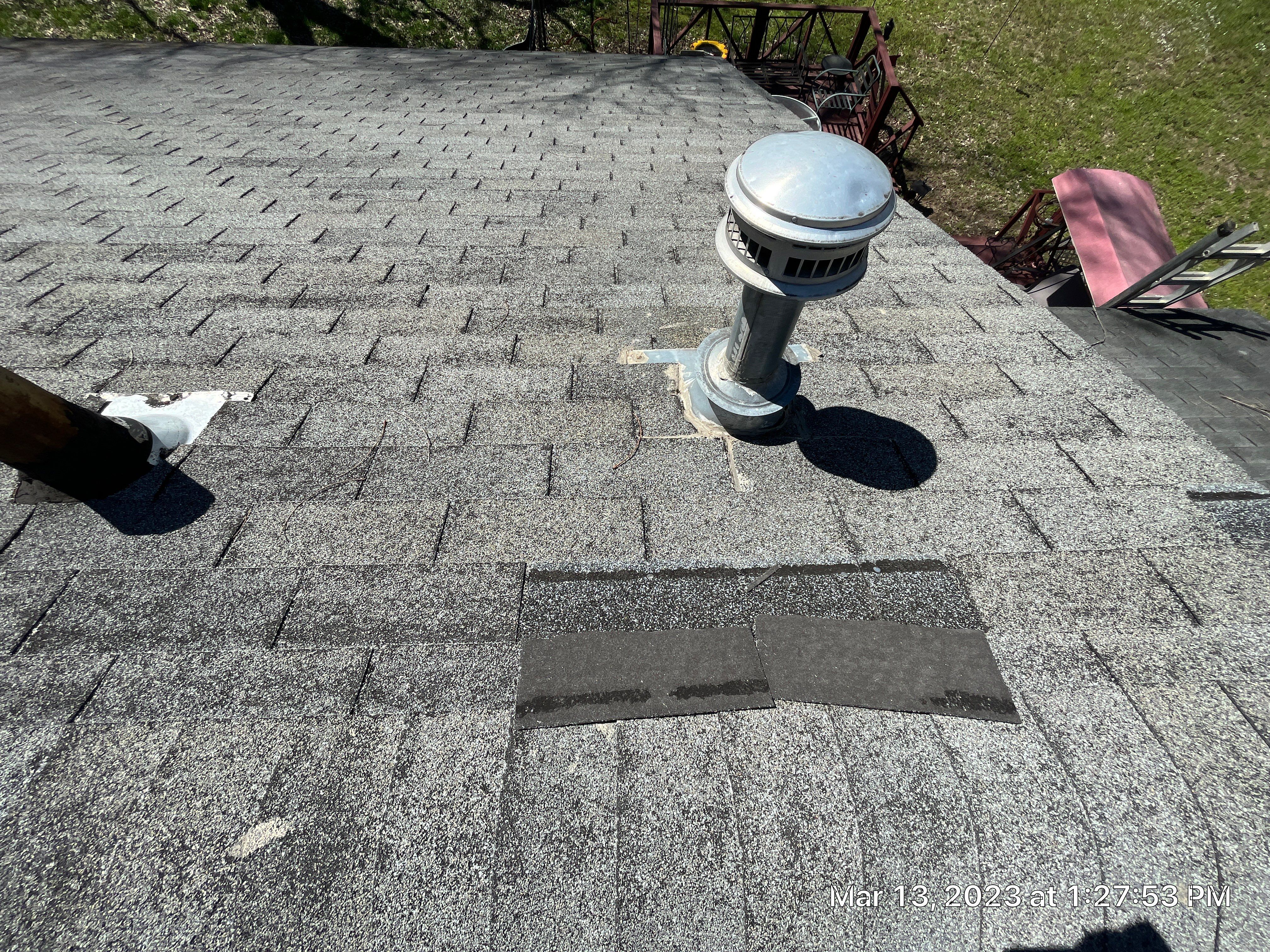 Residential Roofing Installation using 26 Gauge Colored Panels by Hostetler Roofing