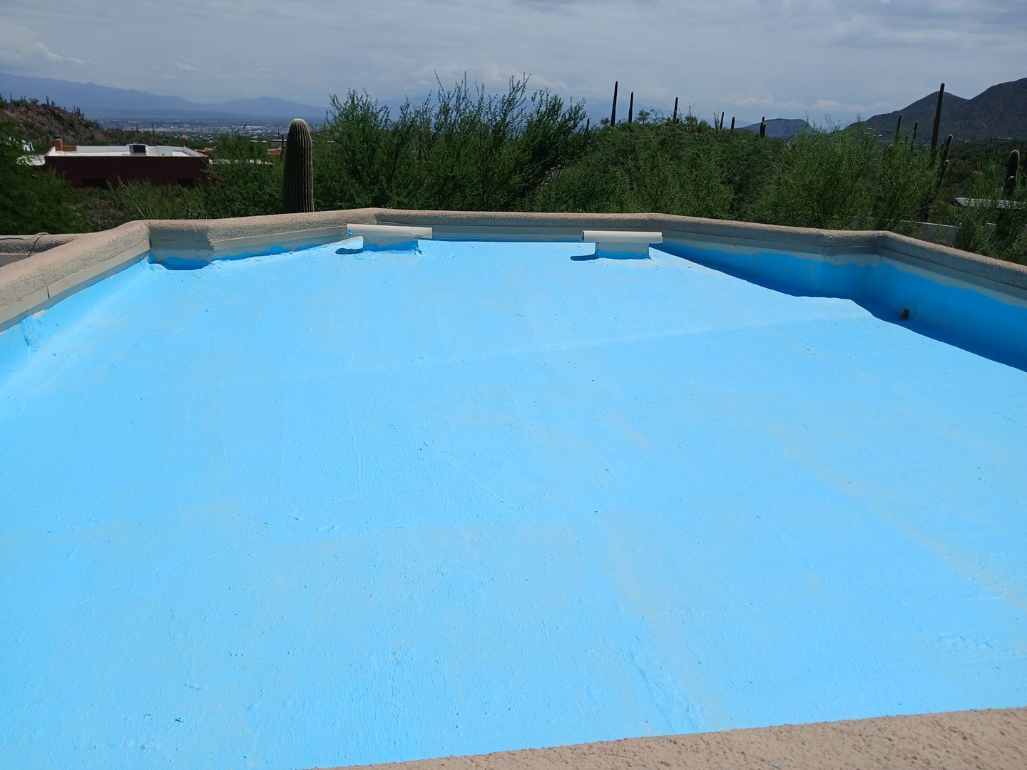 Residential Flat Roof Elastomeric Coating and Restoration in Tucson by West Coast Roofing AZ