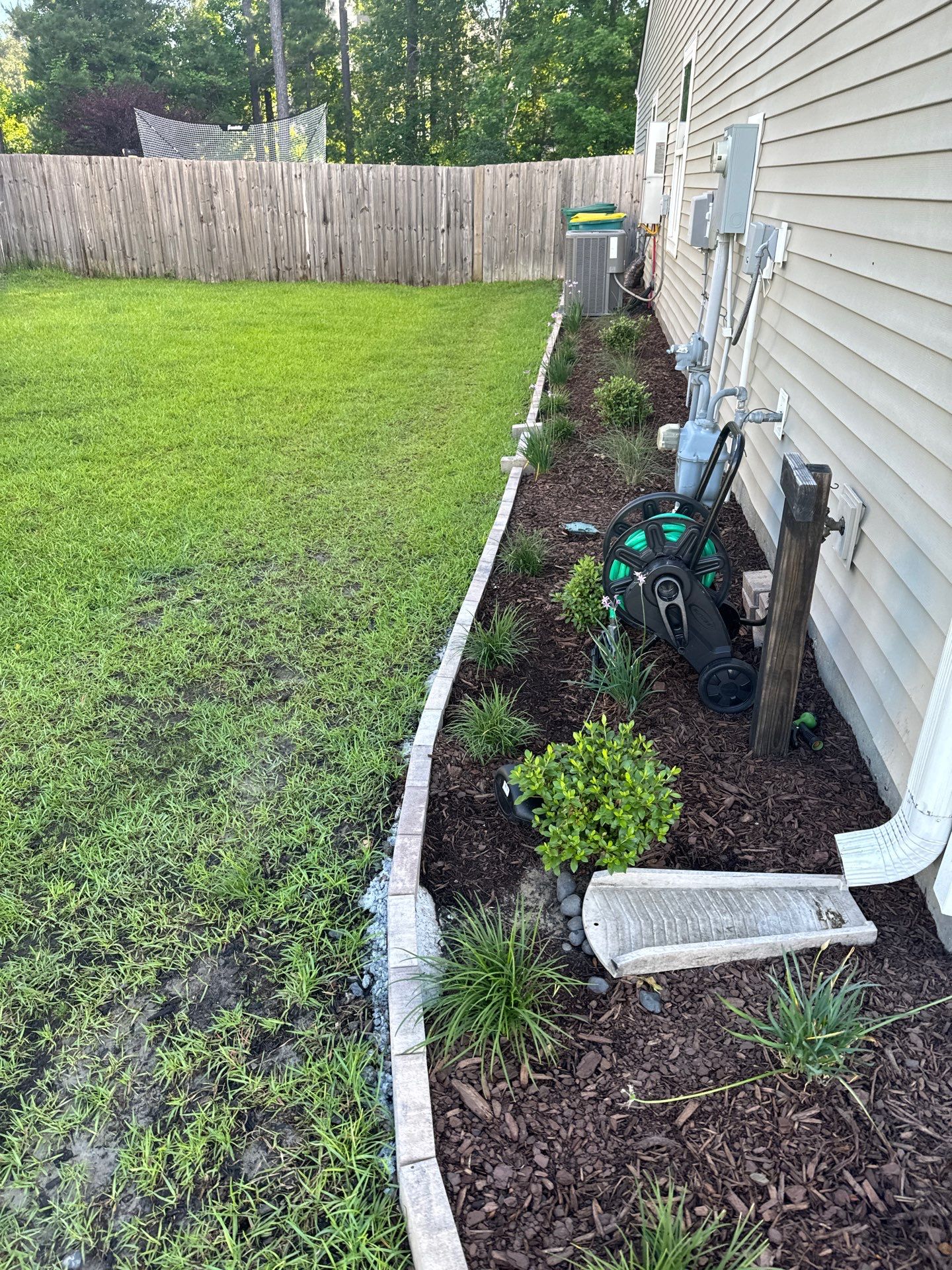 Custom Paver Landscape Edging and Garden Bed Mulching in Bluffton by Lowcountry Scapes, LLC