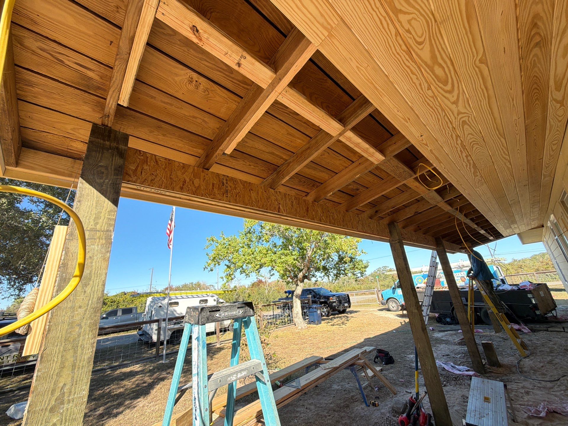 Patio? We got you Covered! by Bayfront Roofing and Construction