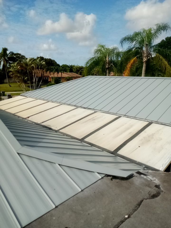 Residential Roofing Installation using 1" Nail strip metal roof by BLUES BROTHERS CONSTRUCTION CORP