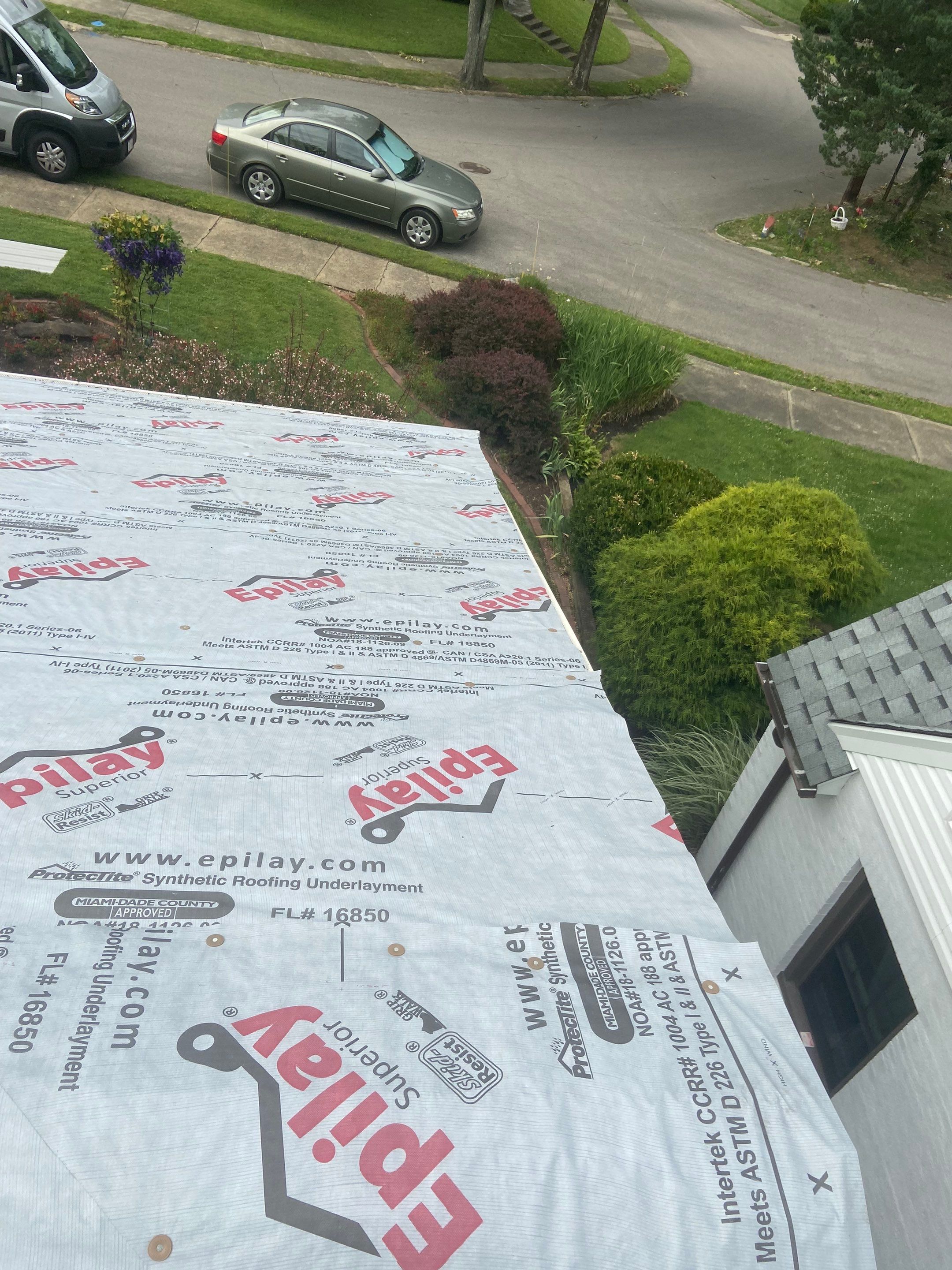 Metal Roofing, Skylights, Porch Build by Secure Construction Company Inc