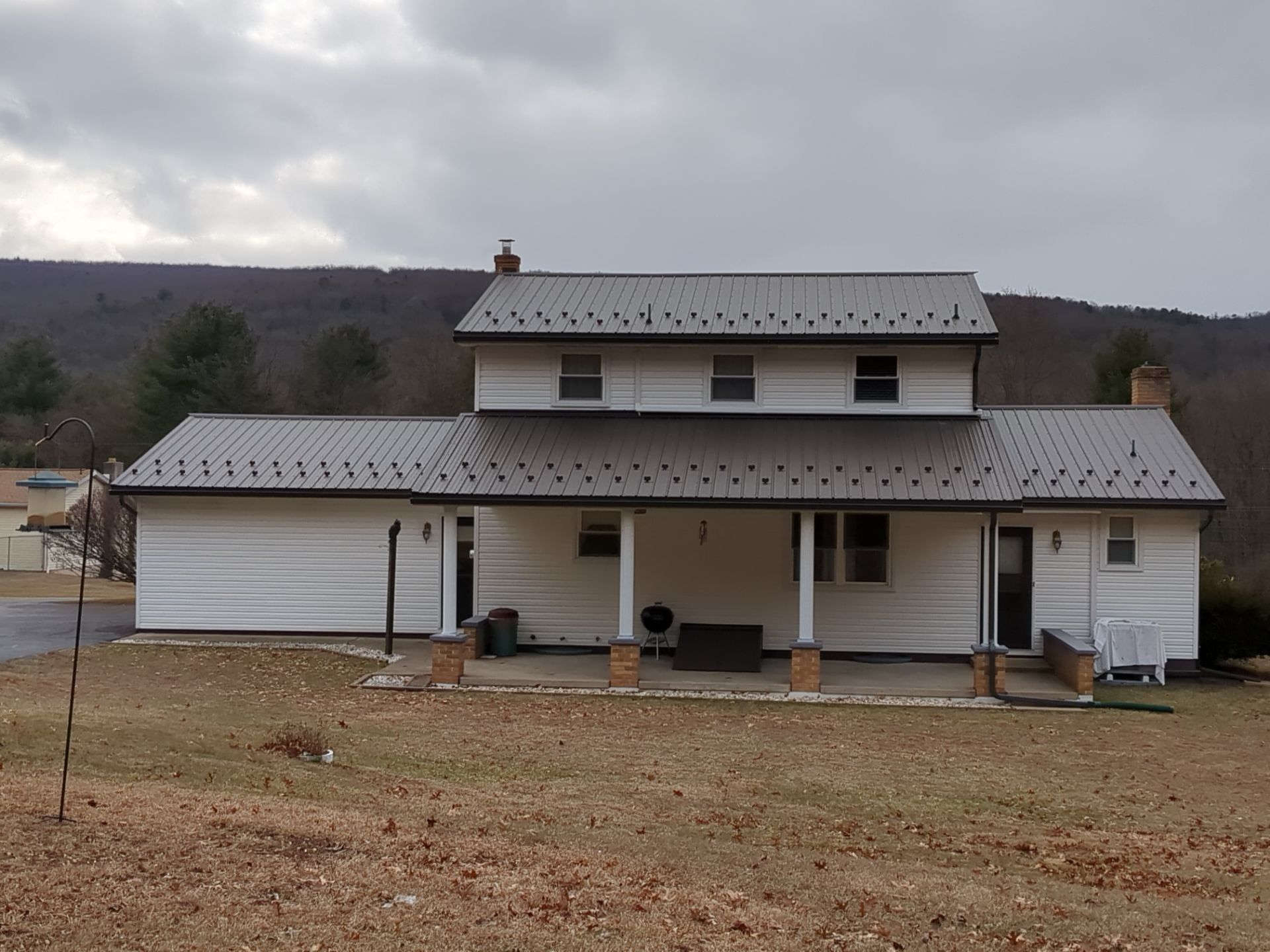 AB Martin Metal Roof Installation-Black by Esh Builders