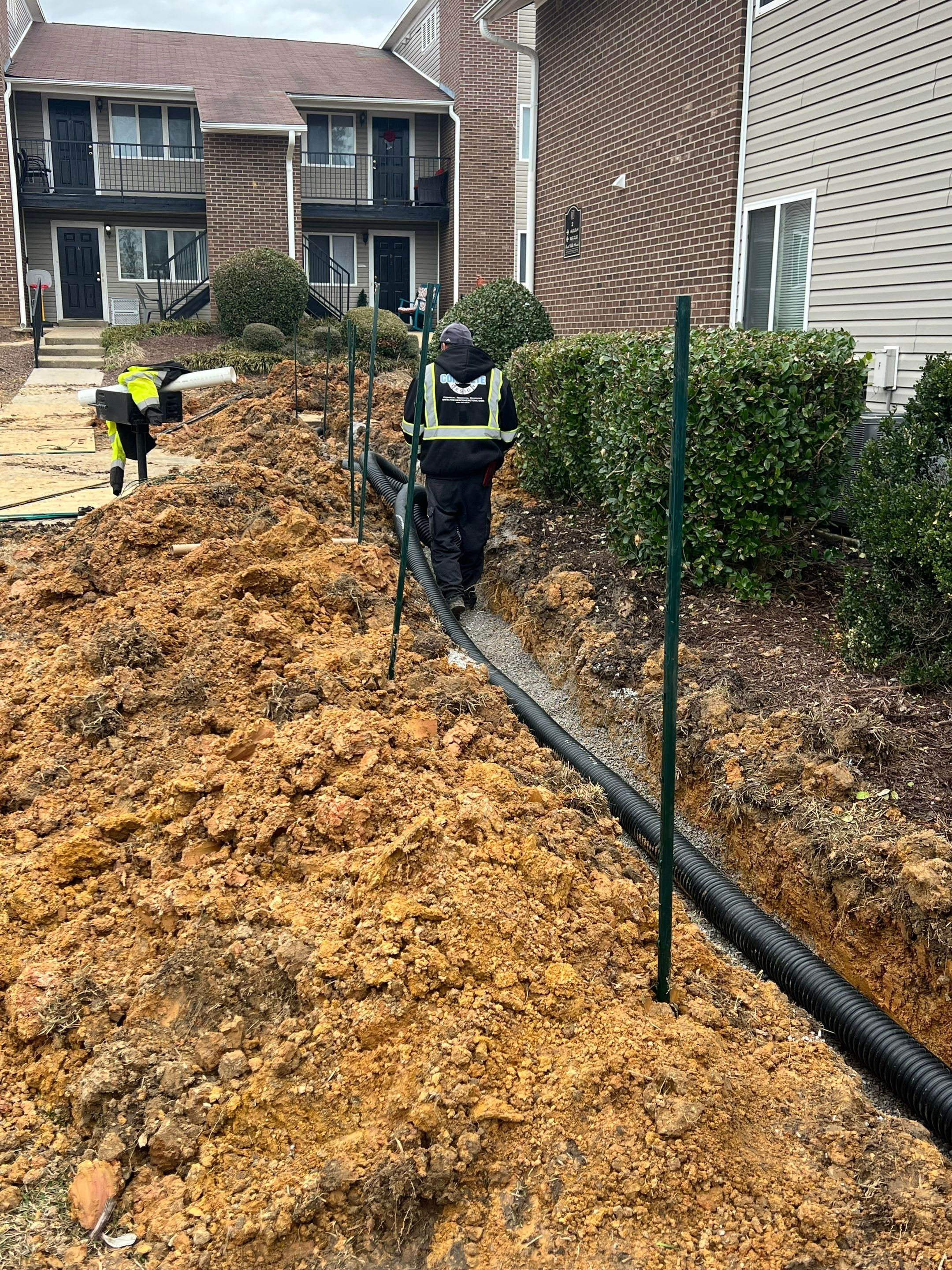 Private Water Main Repair & Site Drainage – Forest Hills Manor by S.W. Contracting & Consulting