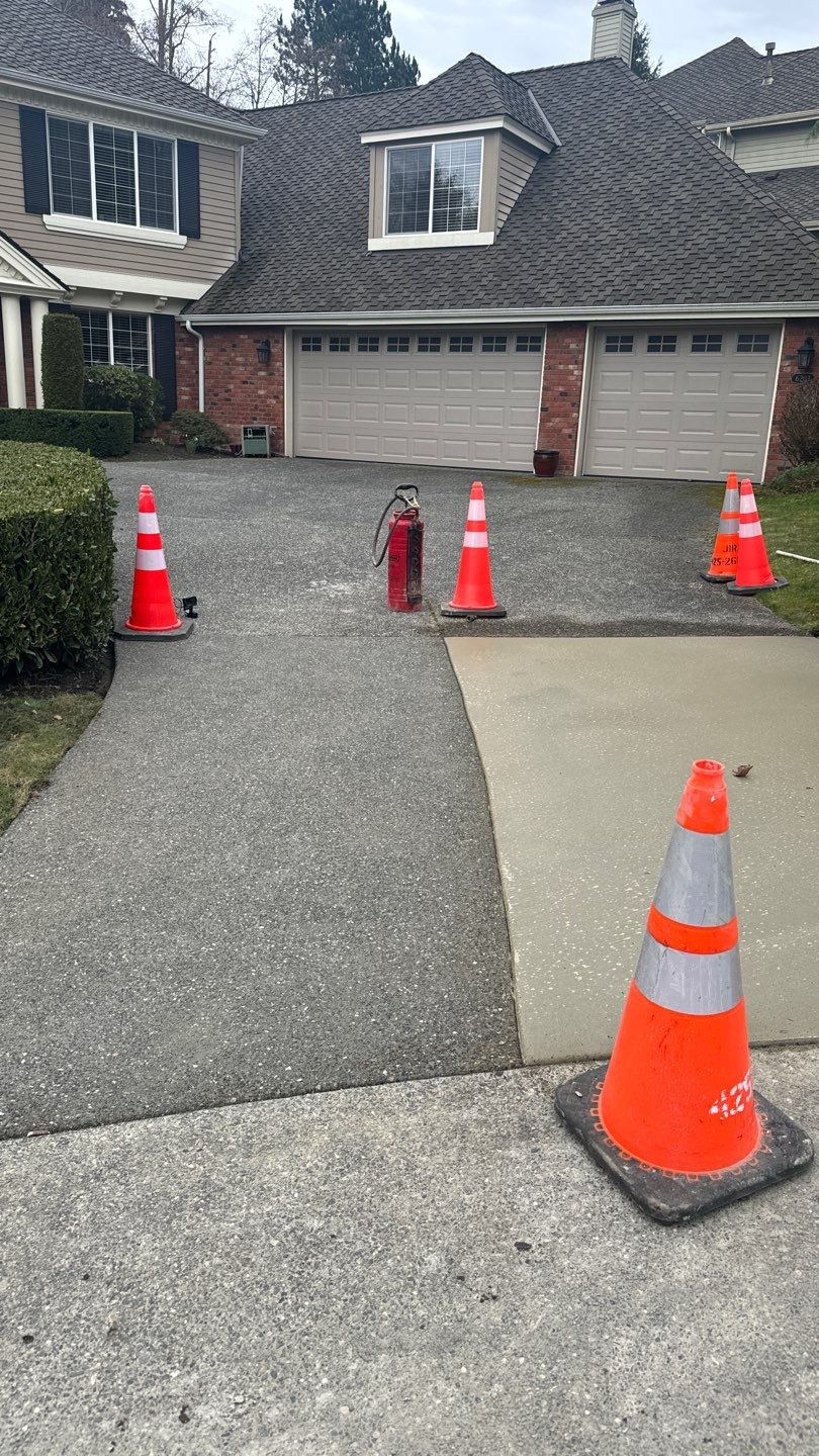 Concrete Driveway Patch Repair & Sealer | Mukilteo  by Jireh Asphalt & Concrete Inc 