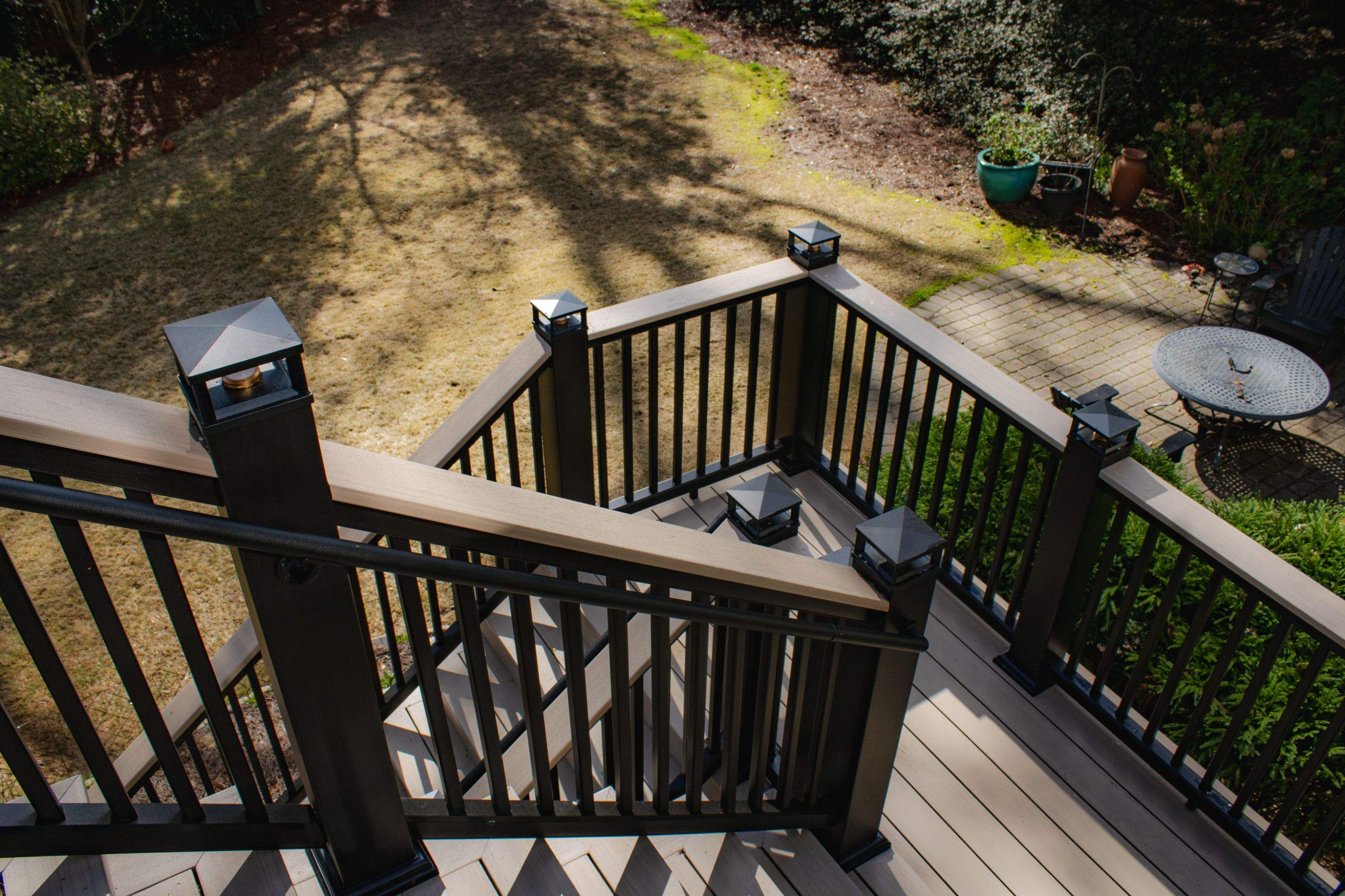 Deck Resurface and Screened-In Porch Build with Timbertech LED Lantern Post Cap Lights by Nelson Exteriors