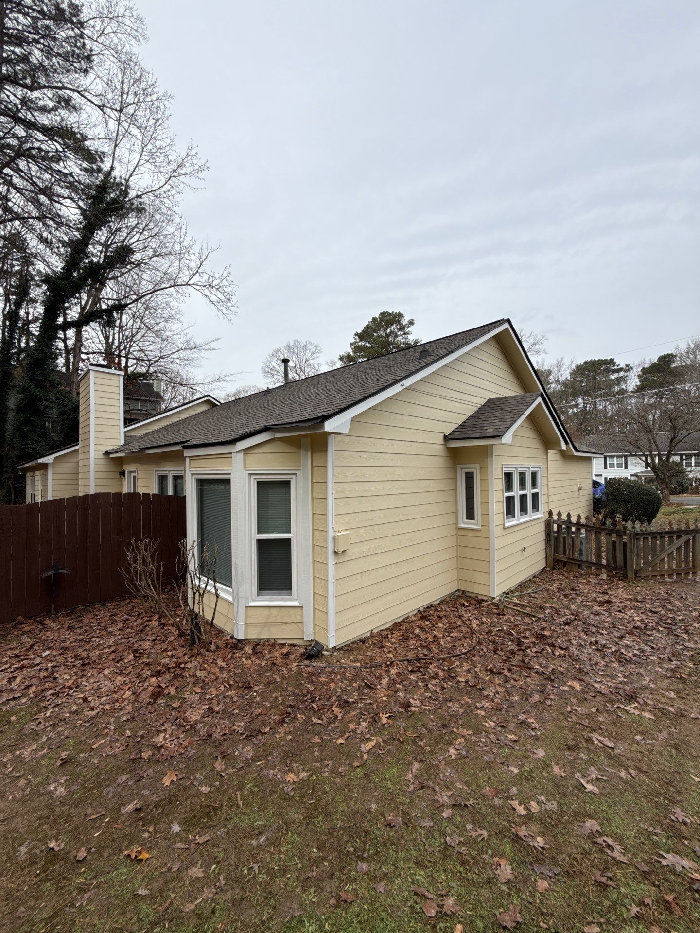 Norcross Exterior Remodel With New Lap Siding and Window Installation by Swift Home Renovations